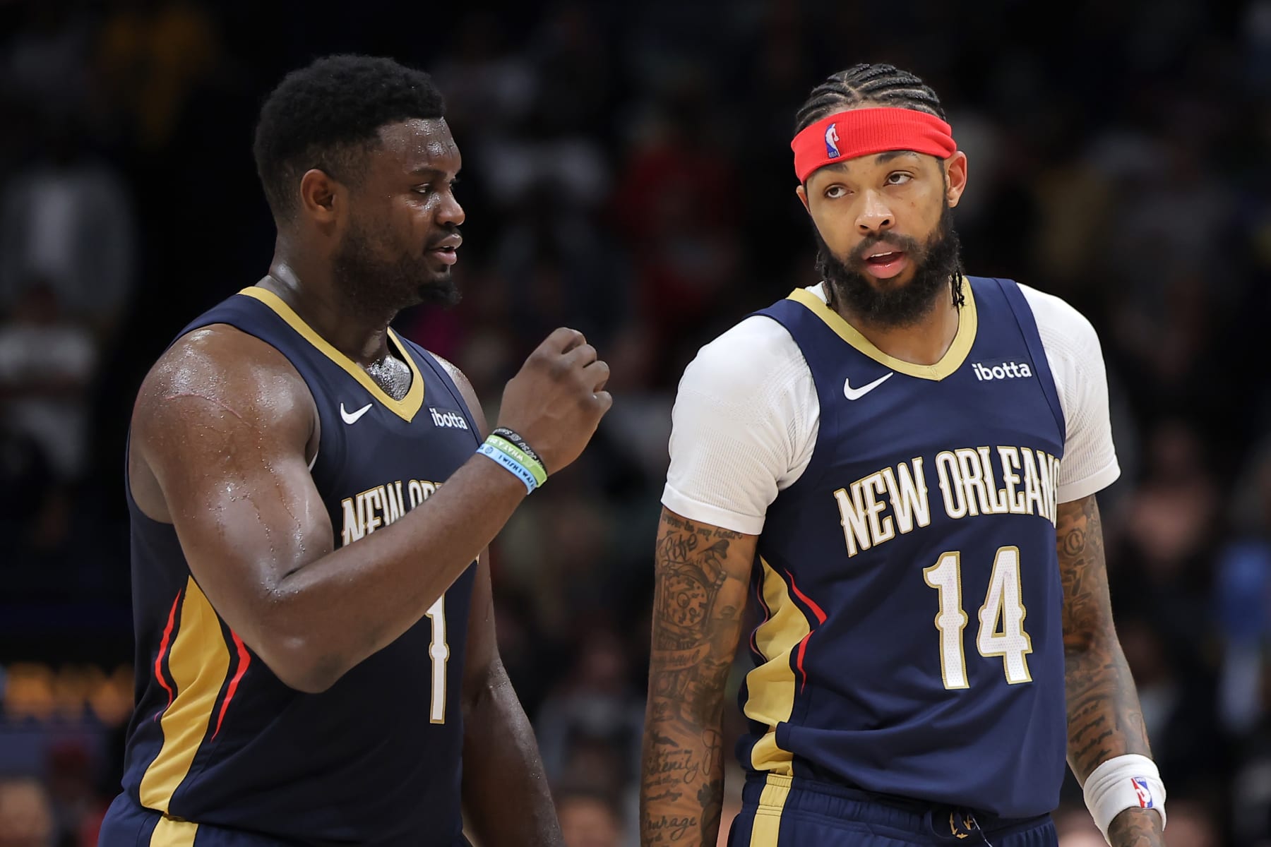NEW ORLEANS, LOUISIANA - NOVEMBER 22: Zion Williamson #1 and Brandon Ingram #14 of the New Orleans Pelicans talk against the Sacramento Kings during the second half at the Smoothie King Center on November 22, 2023 in New Orleans, Louisiana. NOTE TO USER: User expressly acknowledges and agrees that, by downloading and or using this Photograph, user is consenting to the terms and conditions of the Getty Images License Agreement. (Photo by Jonathan Bachman/Getty Images)