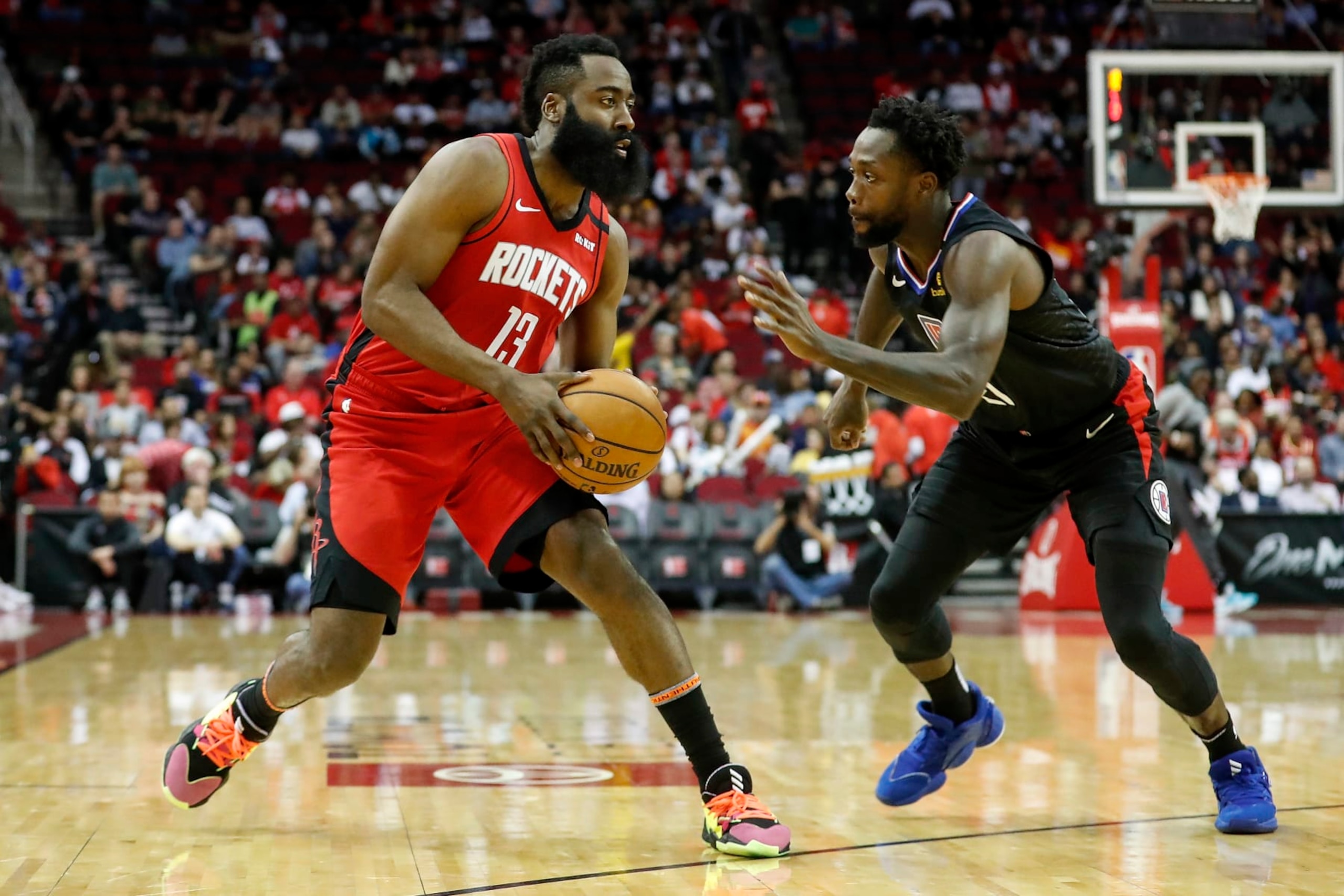 HOUSTON, TEXAS - MARCH 05: James Harden #13 of the Houston Rockets steps back for a shot while defended by Patrick Beverley #21 of the LA Clippers in the first half at Toyota Center on March 05, 2020 in Houston, Texas. NOTE TO USER: User expressly acknowledges and agrees that, by downloading and or using this photograph, User is consenting to the terms and conditions of the Getty Images License Agreement. (Photo by Tim Warner/Getty Images) HOUSTON, TEXAS - MARCH 05: James Harden #13 of the Houston Rockets steps back for a shot while defended by Patrick Beverley #21 of the LA Clippers in the first half at Toyota Center on March 05, 2020 in Houston, Texas. NOTE TO USER: User expressly acknowledges and agrees that, by downloading and or using this photograph, User is consenting to the terms and conditions of the Getty Images License Agreement. (Photo by Tim Warner/Getty Images)