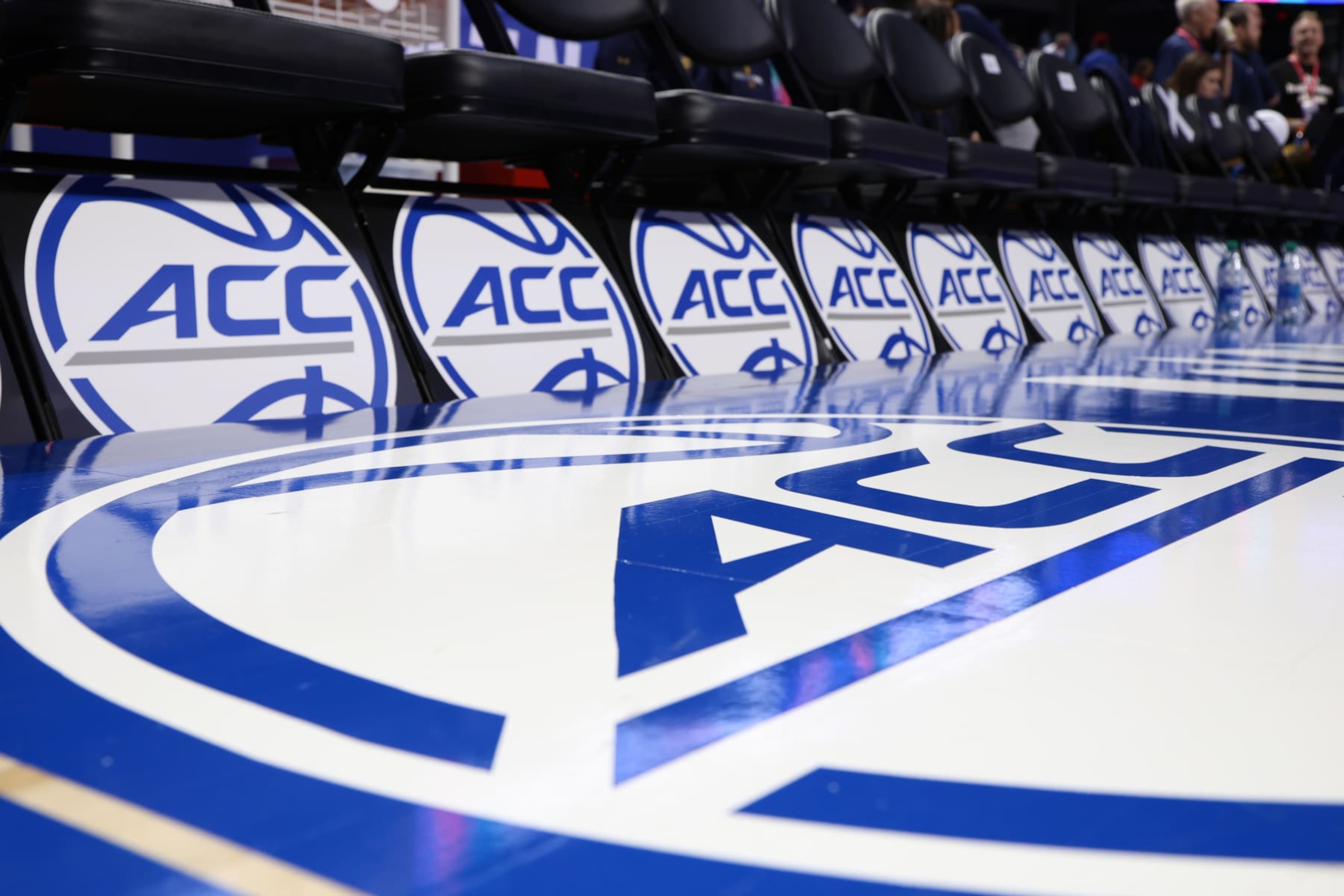 GREENSBORO, NC - MARCH 08: ACC logos adorn the benches during the first round of the Women's ACC Tournament between the Notre Dame Fighting Irish and the Louisville Cardinals on March 8, 2024 at Greensboro Coliseum in Greensboro, NC. (Photo by Nicholas Faulkner/Icon Sportswire via Getty Images) GREENSBORO, NC - MARCH 08: ACC logos adorn the benches during the first round of the Women's ACC Tournament between the Notre Dame Fighting Irish and the Louisville Cardinals on March 8, 2024 at Greensboro Coliseum in Greensboro, NC. (Photo by Nicholas Faulkner/Icon Sportswire via Getty Images)