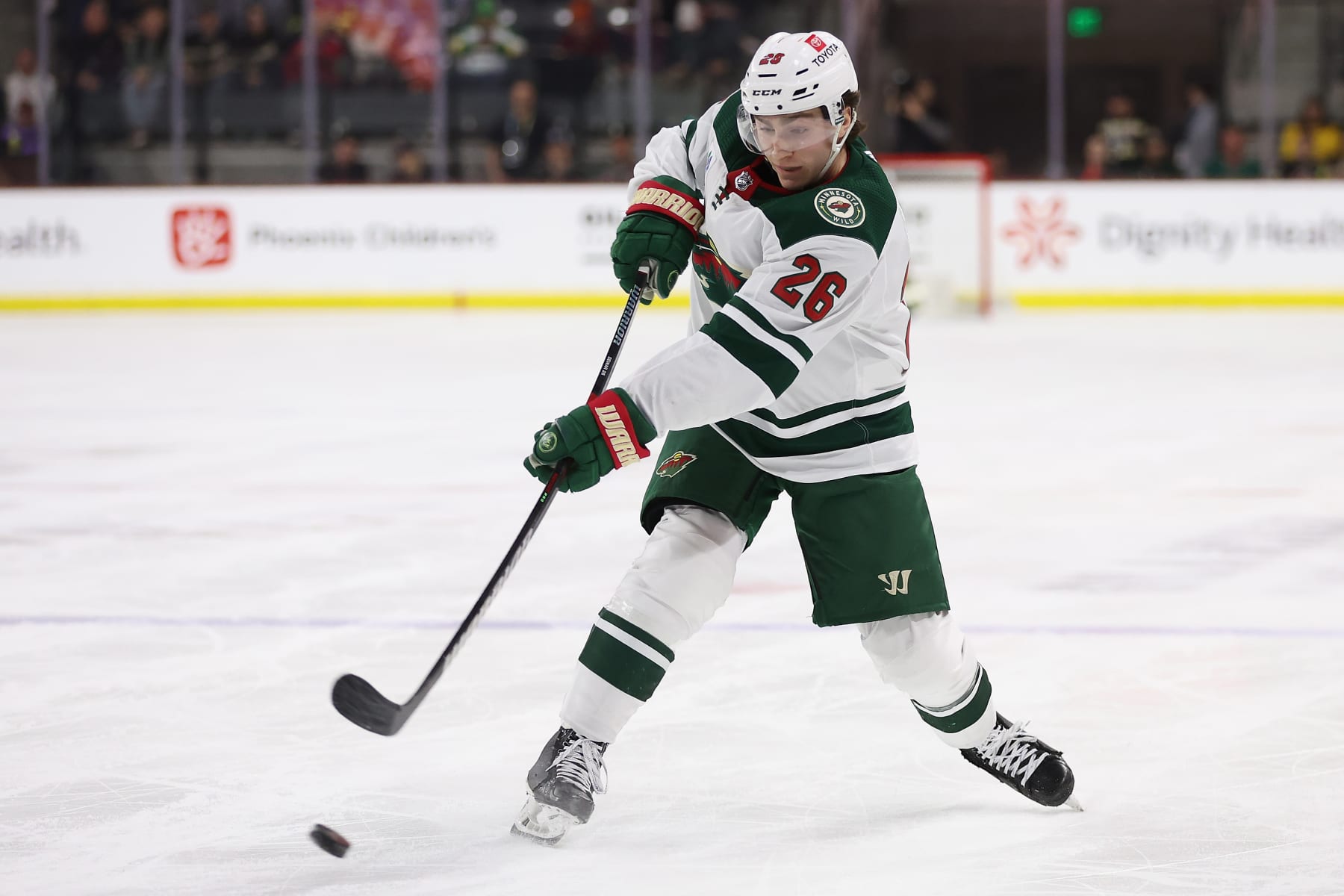 TEMPE, ARIZONA - MARCH 07: Connor Dewar #26 of the Minnesota Wild shoots the puck against the Arizona Coyotes during the first period of the NHL game at Mullett Arena on March 07, 2024 in Tempe, Arizona. (Photo by Christian Petersen/Getty Images)