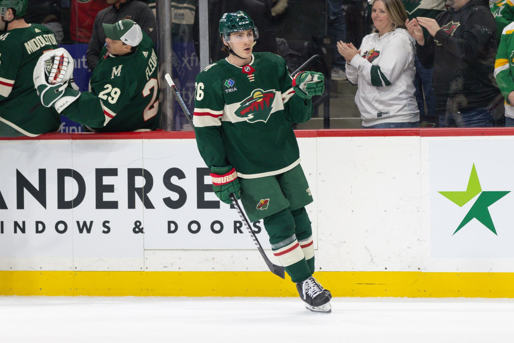 Saint Paul, MN - FEBRUARY 27: Minnesota Wild center Connor Dewar (26) points to goaltender Filip Gustavsson (32) after scoring a goal during the first period of an NHL game between the Carolina Hurricanes and Minnesota Wild on February 27th, 2024, at the Xcel Energy Center in Saint Paul, MN. (Photo by Bailey Hillesheim/Icon Sportswire via Getty Images)