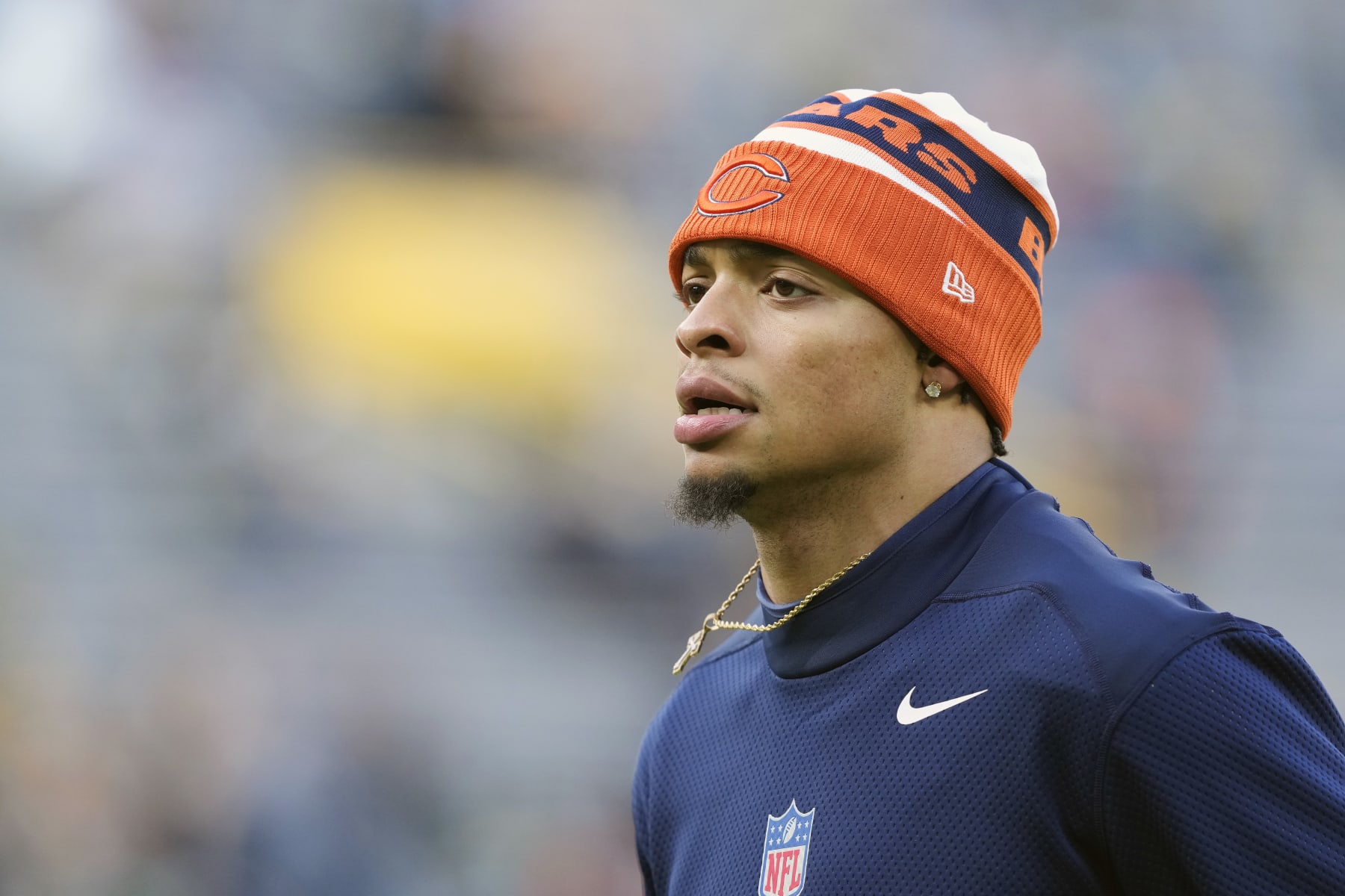 GREEN BAY, WISCONSIN - JANUARY 07: Justin Fields #1 of the Chicago Bears warms up before a game against the Green Bay Packers at Lambeau Field on January 07, 2024 in Green Bay, Wisconsin. (Photo by Patrick McDermott/Getty Images)