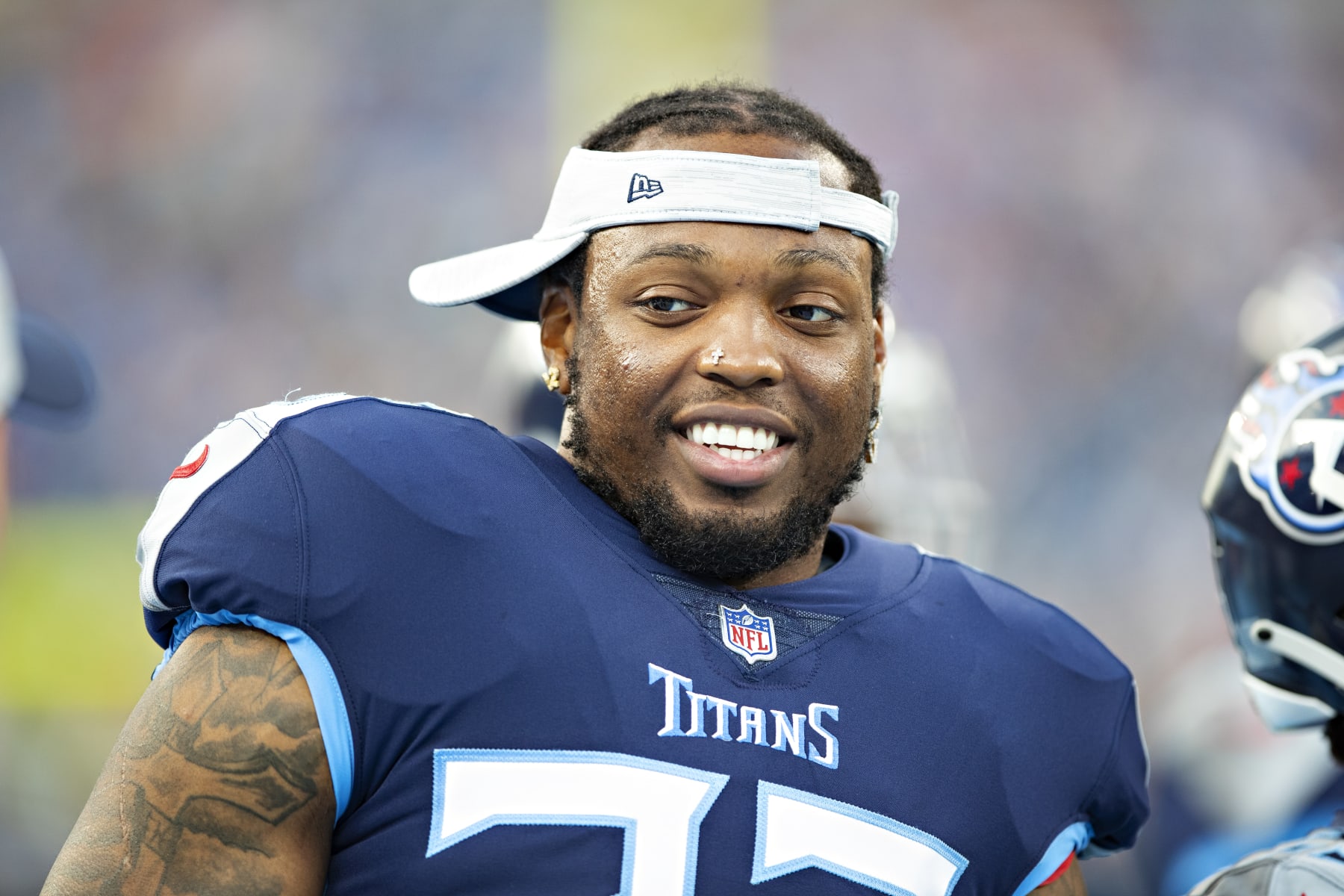 NASHVILLE, TN - AUGUST 28:  Derrick Henry #22 of the Tennessee Titans on the sidelines during a NFL Preseason game against the Chicago Bears at Nissan Stadium on August 28, 2021 in Nashville, Tennessee.  The Bears defeated the Titans 27-24.  (Photo by Wesley Hitt/Getty Images)