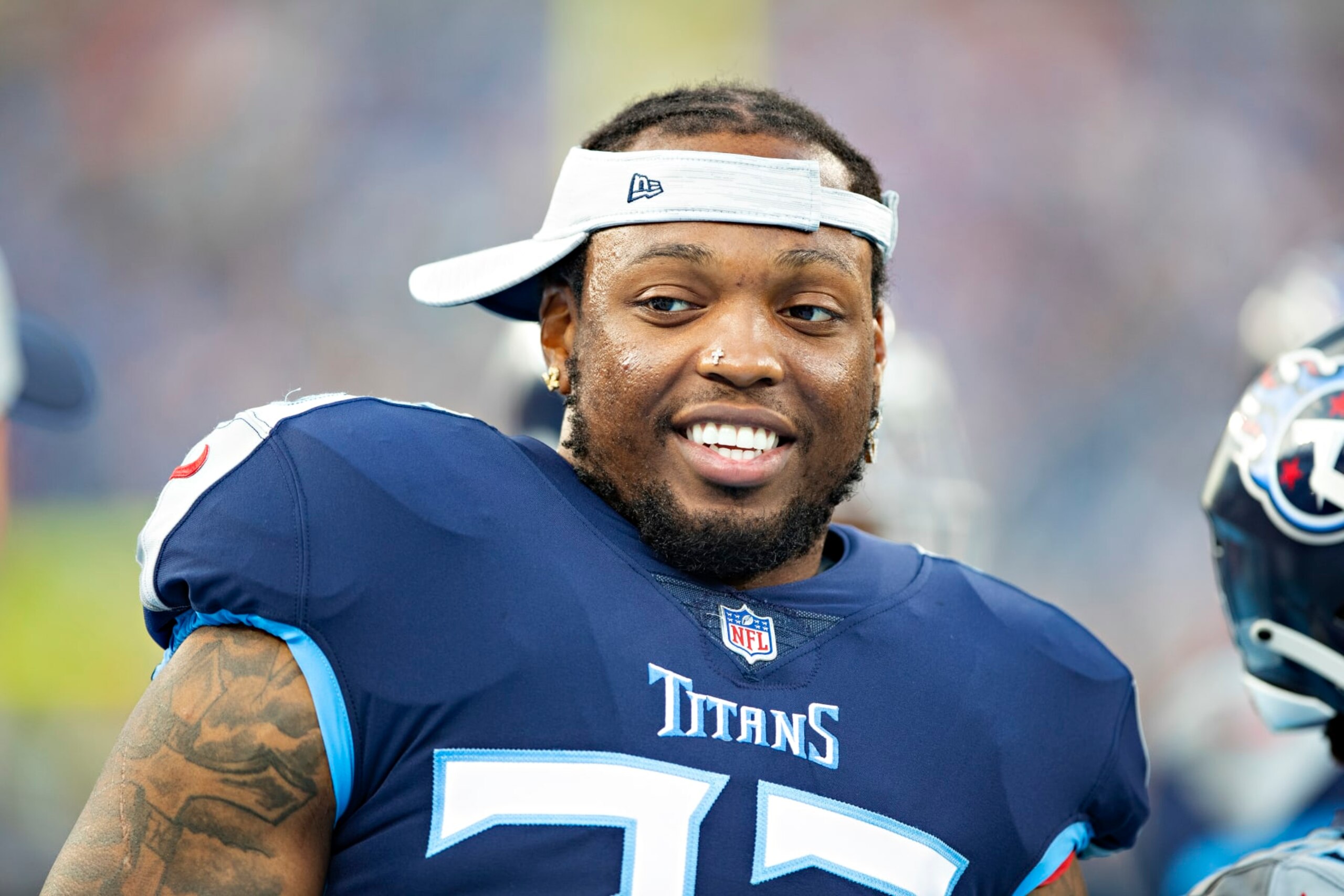 NASHVILLE, TN - AUGUST 28: Derrick Henry #22 of the Tennessee Titans on the sidelines during a NFL Preseason game against the Chicago Bears at Nissan Stadium on August 28, 2021 in Nashville, Tennessee. The Bears defeated the Titans 27-24. (Photo by Wesley Hitt/Getty Images) NASHVILLE, TN - AUGUST 28: Derrick Henry #22 of the Tennessee Titans on the sidelines during a NFL Preseason game against the Chicago Bears at Nissan Stadium on August 28, 2021 in Nashville, Tennessee. The Bears defeated the Titans 27-24. (Photo by Wesley Hitt/Getty Images)