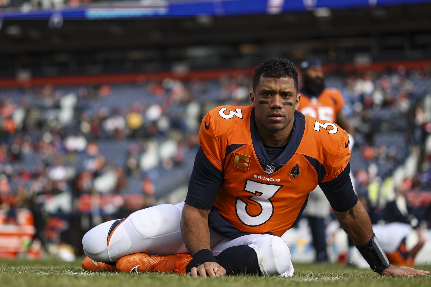 DENVER, CO - DECEMBER 31: Russell Wilson #3 of the Denver Broncos warms up prior to an NFL football game against the Los Angeles Chargers at Empower Field at Mile High on December 31, 2023 in Denver, Colorado. (Photo by Perry Knotts/Getty Images)