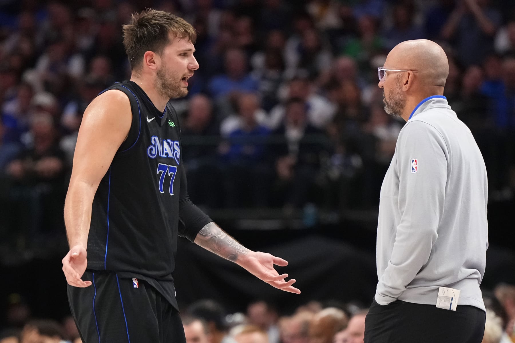 DALLAS, TEXAS - MARCH 03: Luka Doncic #77 of the Dallas Mavericks talks to head coach Jason Kidd during the second half against the Philadelphia 76ers at American Airlines Center on March 03, 2024 in Dallas, Texas. NOTE TO USER: User expressly acknowledges and agrees that, by downloading and or using this photograph, User is consenting to the terms and conditions of the Getty Images License Agreement. (Photo by Sam Hodde/Getty Images)