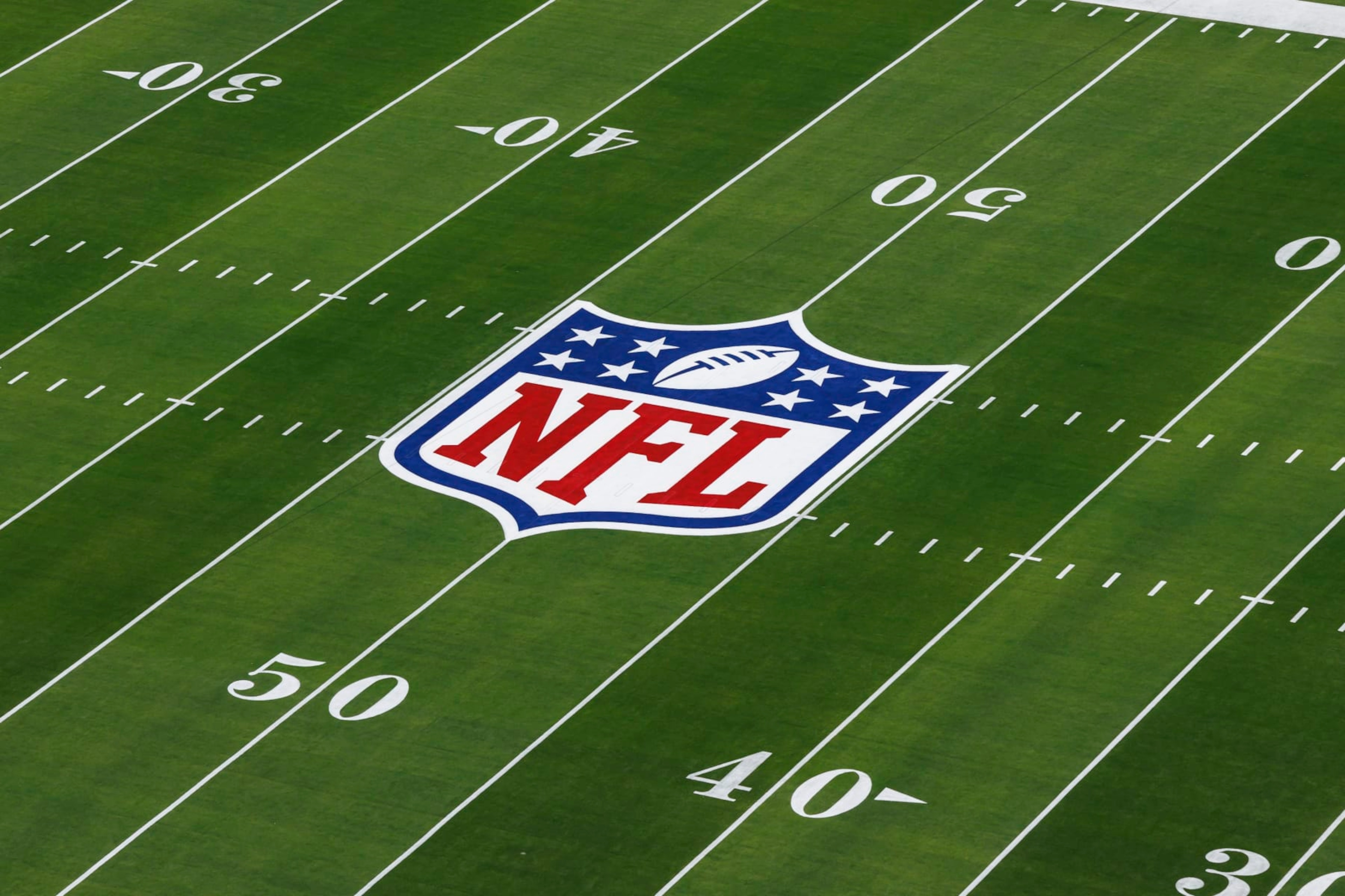 LAS VEGAS, NEVADA - FEBRUARY 11: A detail view of the NFL shield logo painted on the field before the NFL Super Bowl LVIII football game between the Kansas City Chiefs and San Francisco 49ers at Allegiant Stadium on February 11, 2024 in Las Vegas, Nevada. (Photo by Ryan Kang/Getty Images)