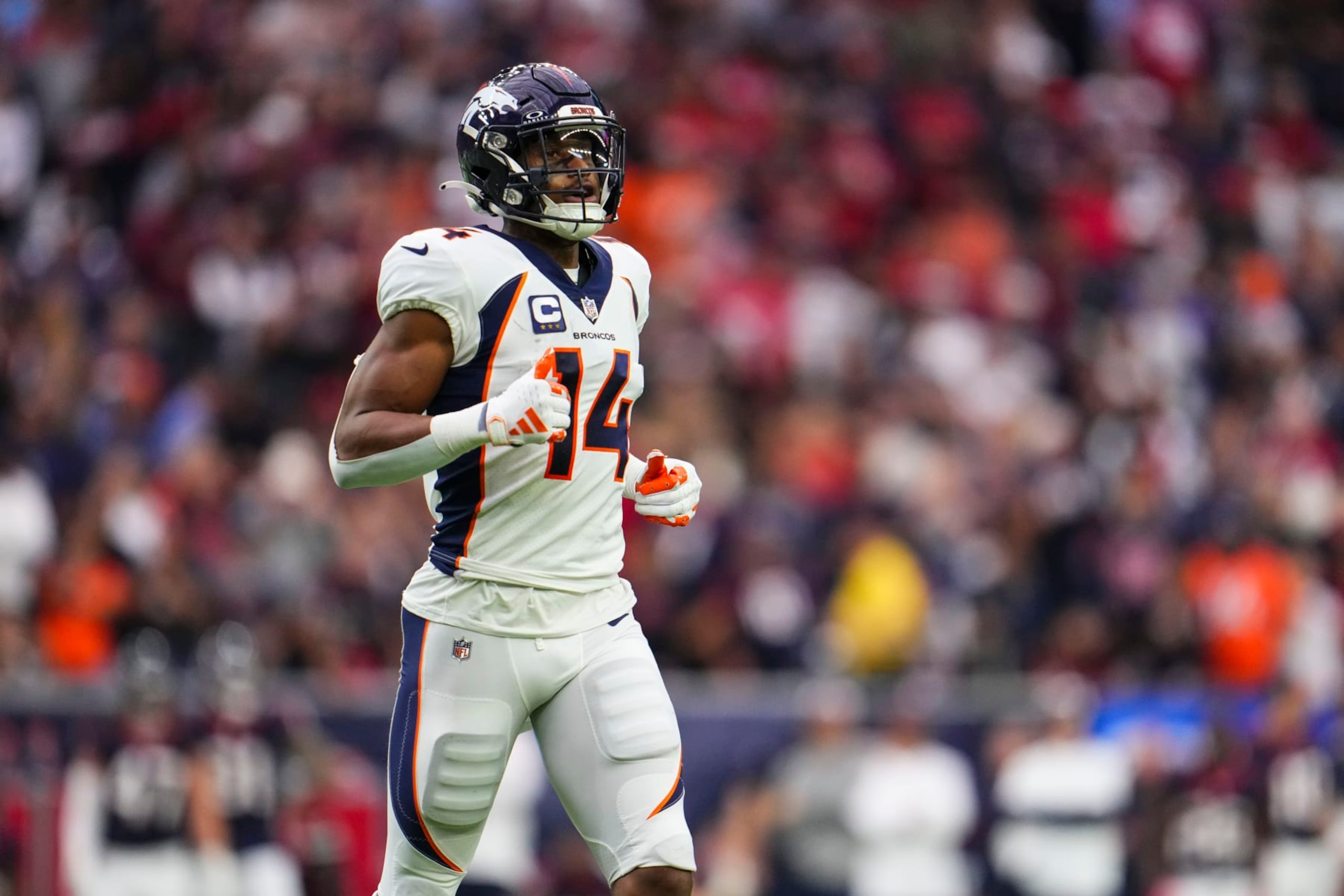 HOUSTON, TX - DECEMBER 03: Courtland Sutton #14 of the Denver Broncos runs across the field during an NFL football game against the Houston Texans at NRG Stadium on December 3, 2023 in Houston, Texas. (Photo by Cooper Neill/Getty Images)
