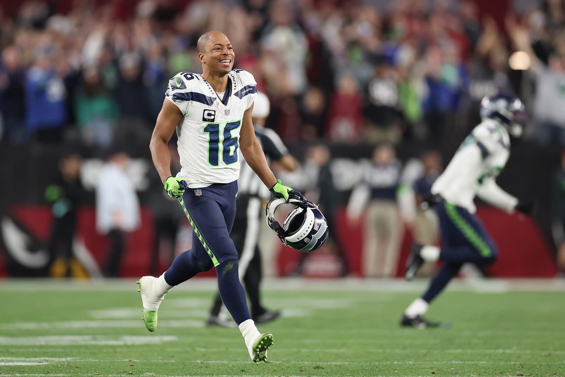 GLENDALE, ARIZONA - JANUARY 07: Wide receiver Tyler Lockett #16 of the Seattle Seahawks reacts after defeating the Arizona Cardinals during the NFL game at State Farm Stadium on January 07, 2024 in Glendale, Arizona.  The Seahawks defeated the Cardinals 21-20. (Photo by Christian Petersen/Getty Images)