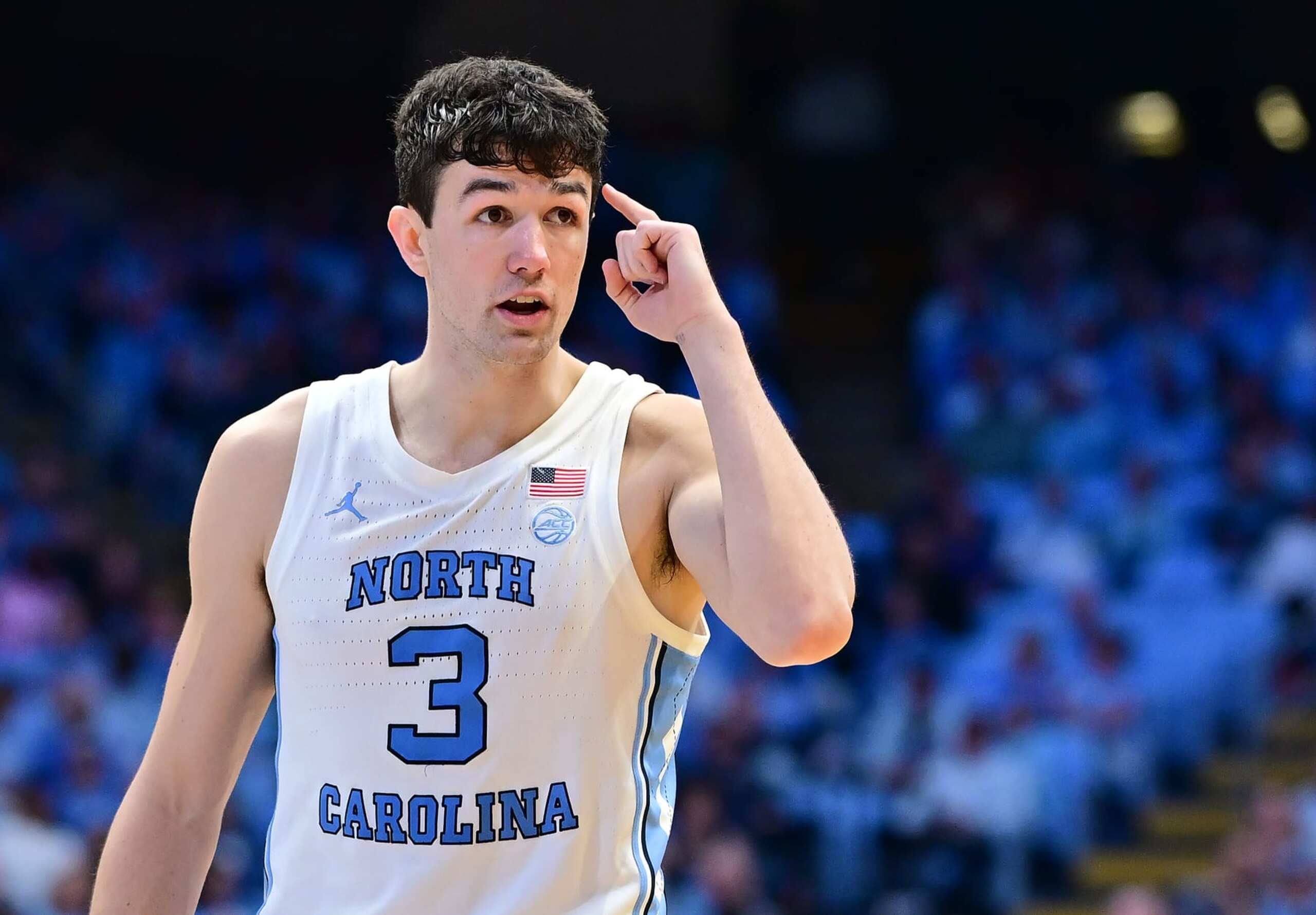 CHAPEL HILL, NORTH CAROLINA - FEBRUARY 26: Cormac Ryan #3 of the North Carolina Tar Heels tells his teammates to play smart during the second half of the game against the Miami Hurricanes at the Dean E. Smith Center on February 26, 2024 in Chapel Hill, North Carolina. The Tar Heels won 75-71. (Photo by Grant Halverson/Getty Images)