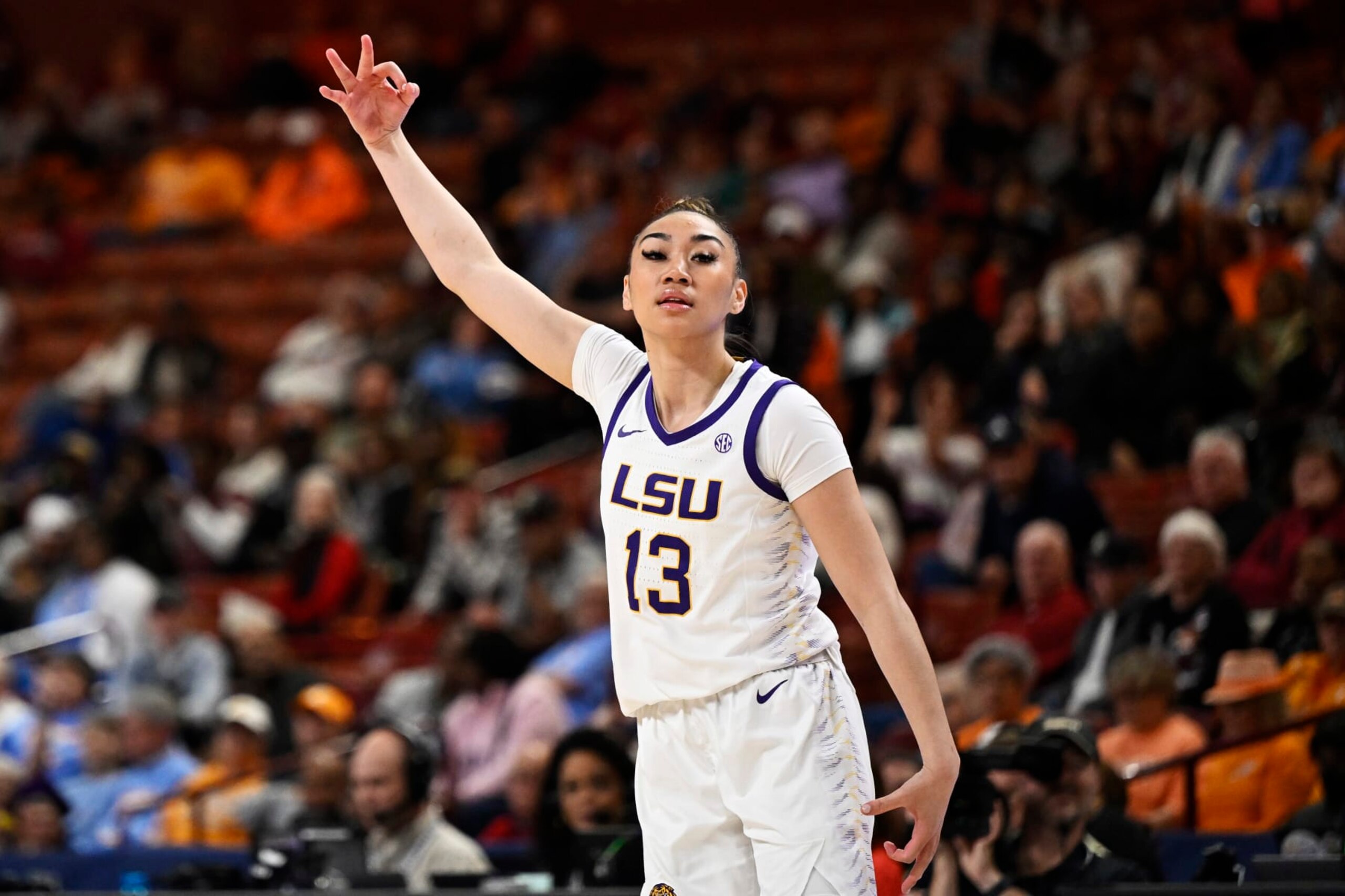 GREENVILLE, SOUTH CAROLINA - MARCH 09: Last-Tear Poa #13 of the LSU Lady Tigers celebrates a three point basket against the Ole Miss Rebels in the third quarter during the semifinals of the SEC Women's Basketball Tournament at Bon Secours Wellness Arena on March 09, 2024 in Greenville, South Carolina. (Photo by Eakin Howard/Getty Images) GREENVILLE, SOUTH CAROLINA - MARCH 09: Last-Tear Poa #13 of the LSU Lady Tigers celebrates a three point basket against the Ole Miss Rebels in the third quarter during the semifinals of the SEC Women's Basketball Tournament at Bon Secours Wellness Arena on March 09, 2024 in Greenville, South Carolina. (Photo by Eakin Howard/Getty Images)