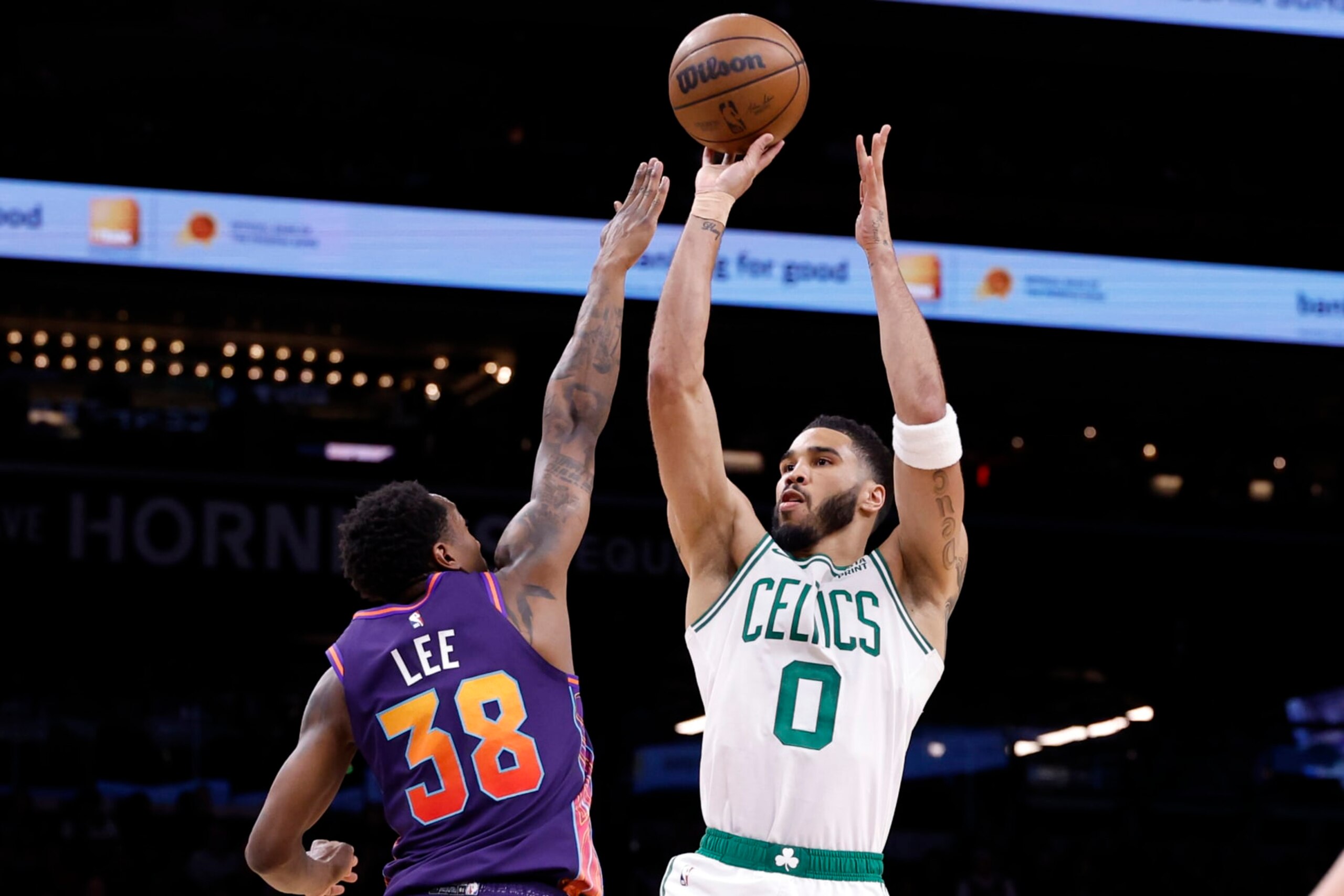 PHOENIX, ARIZONA - MARCH 09: Jayson Tatum #0 of the Boston Celtics attempts a shot over Saben Lee #38 of the Phoenix Suns during the first half at Footprint Center on March 09, 2024 in Phoenix, Arizona. NOTE TO USER: User expressly acknowledges and agrees that, by downloading and or using this photograph, User is consenting to the terms and conditions of the Getty Images License Agreement. (Photo by Chris Coduto/Getty Images) PHOENIX, ARIZONA - MARCH 09: Jayson Tatum #0 of the Boston Celtics attempts a shot over Saben Lee #38 of the Phoenix Suns during the first half at Footprint Center on March 09, 2024 in Phoenix, Arizona. NOTE TO USER: User expressly acknowledges and agrees that, by downloading and or using this photograph, User is consenting to the terms and conditions of the Getty Images License Agreement. (Photo by Chris Coduto/Getty Images)