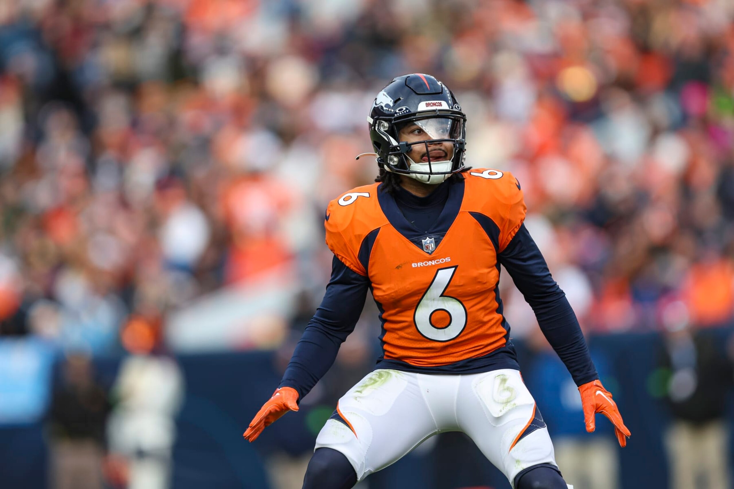DENVER, CO - DECEMBER 31: P.J. Locke #6 of the Denver Broncos defends in coverage during an NFL football game against the Los Angeles Chargers at Empower Field at Mile High on December 31, 2023 in Denver, Colorado. (Photo by Perry Knotts/Getty Images)
