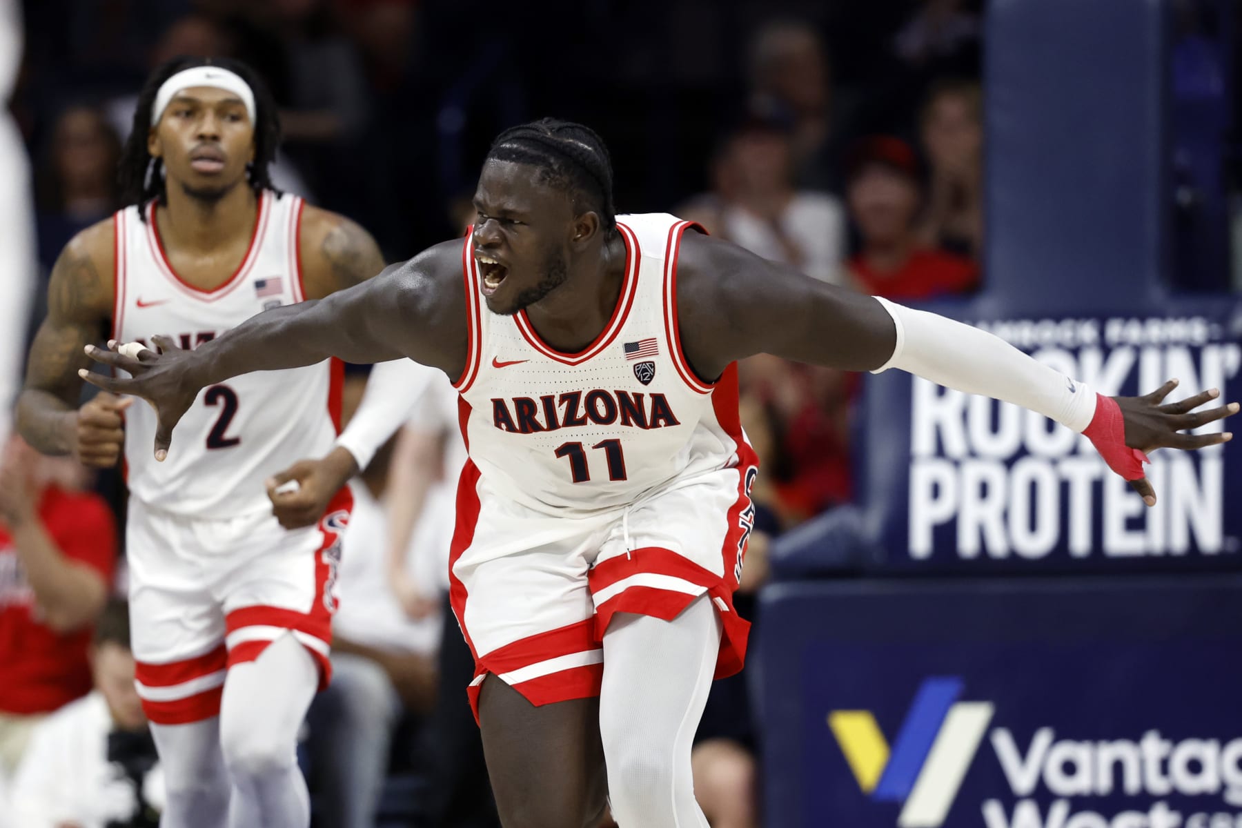TUCSON, ARIZONA - FEBRUARY 24: Oumar Ballo #11 of the Arizona Wildcats reacts after dunking the ball against the Washington Huskies during the second half at McKale Center on February 24, 2024 in Tucson, Arizona. (Photo by Chris Coduto/Getty Images)