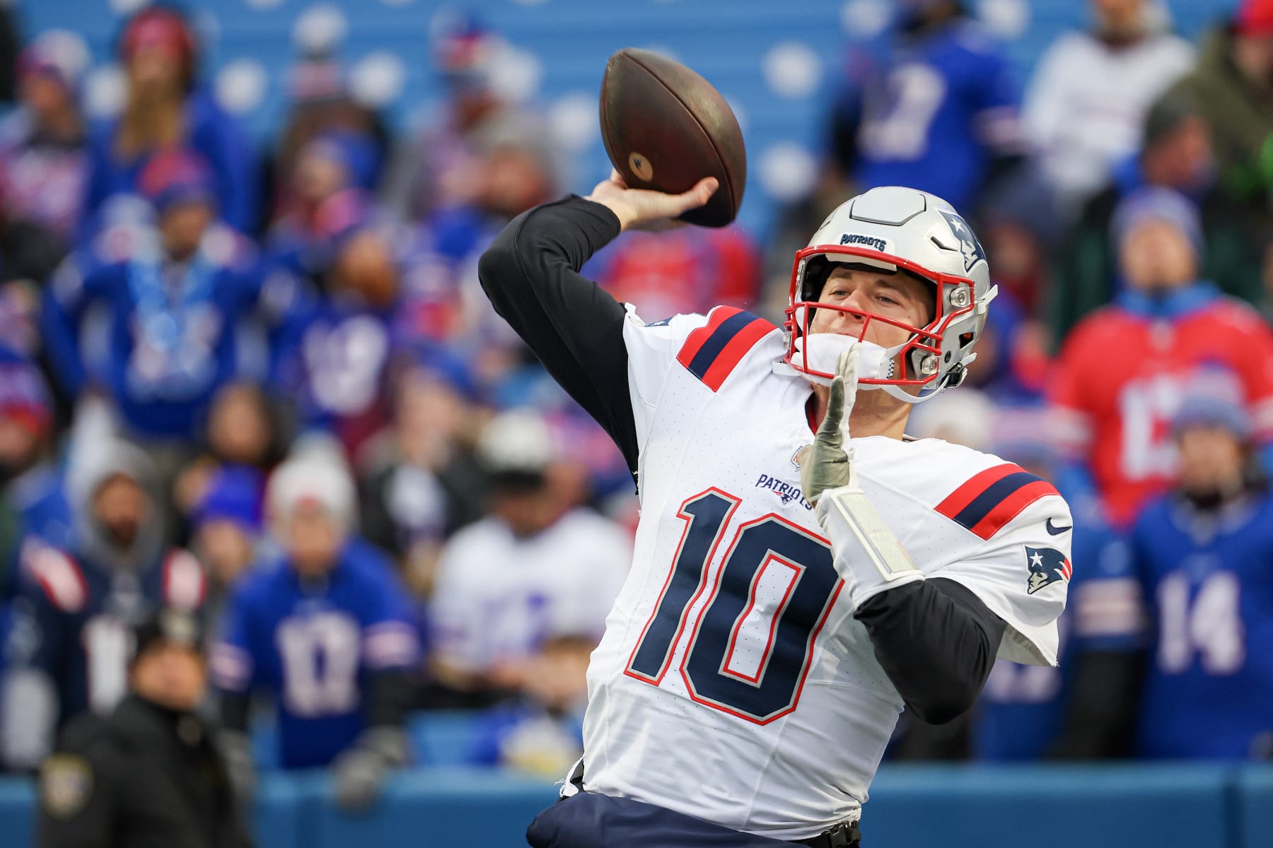 ORCHARD PARK, NEW YORK - DECEMBER 31: Mac Jones #10 of the New England Patriots warms up prior to a game against the Buffalo Bills at Highmark Stadium on December 31, 2023 in Orchard Park, New York. (Photo by Timothy T Ludwig/Getty Images)