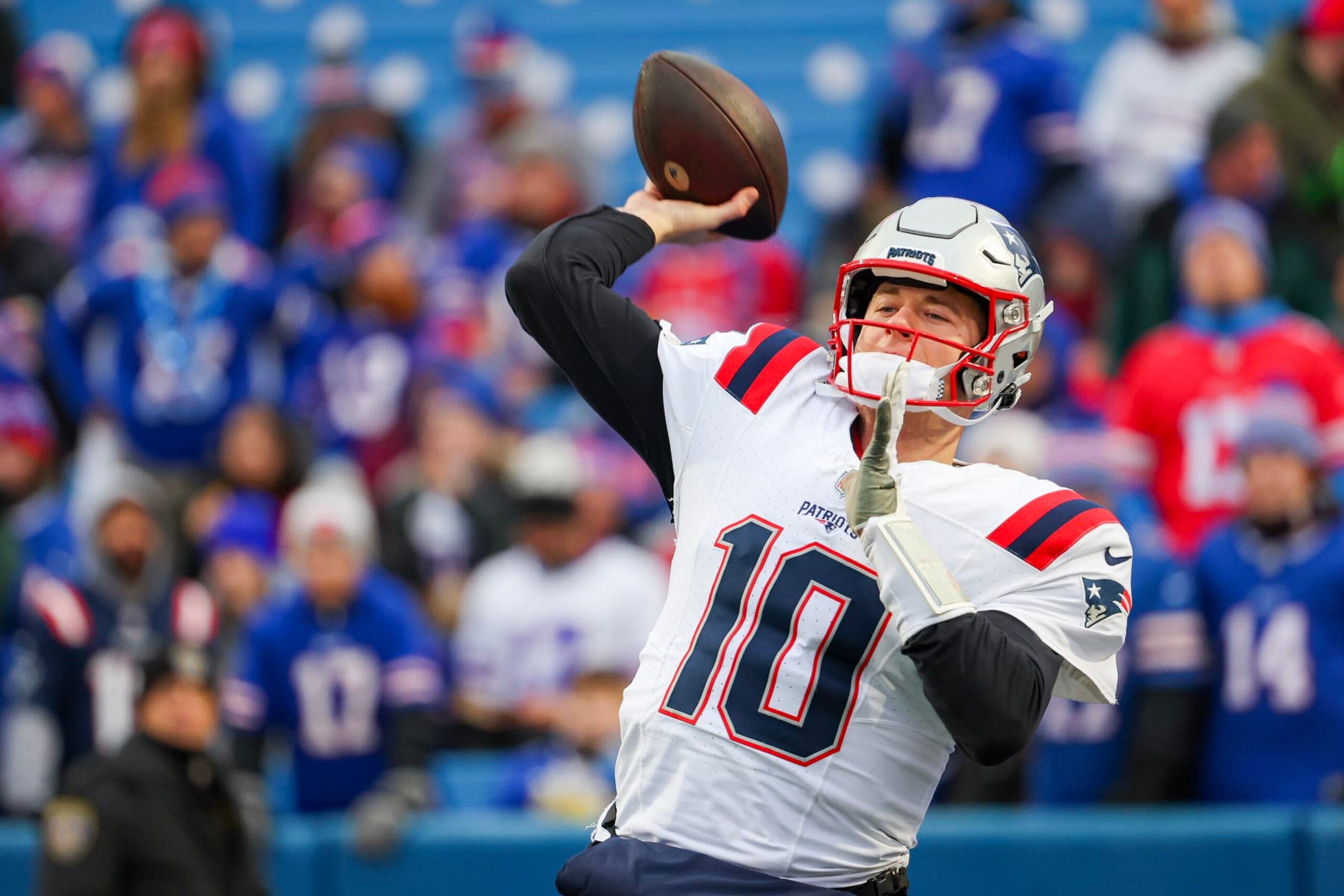 ORCHARD PARK, NEW YORK - DECEMBER 31: Mac Jones #10 of the New England Patriots warms up prior to a game against the Buffalo Bills at Highmark Stadium on December 31, 2023 in Orchard Park, New York. (Photo by Timothy T Ludwig/Getty Images)