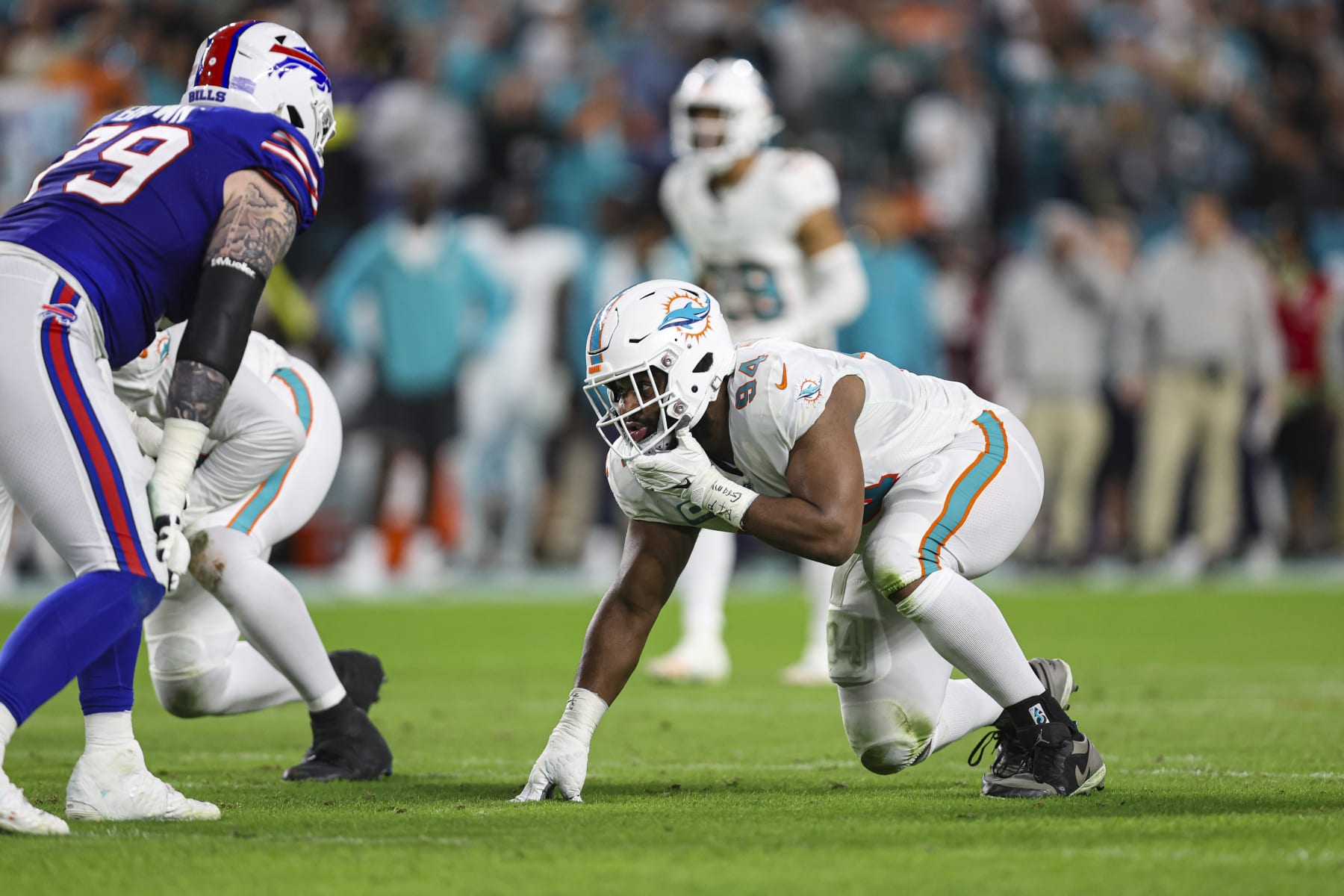 MIAMI GARDENS, FL - JANUARY 07: Christian Wilkins #94 of the Miami Dolphins lines up during an NFL football game against the Buffalo Bills at Hard Rock Stadium on January 7, 2024 in Miami Gardens, Florida. (Photo by Perry Knotts/Getty Images)