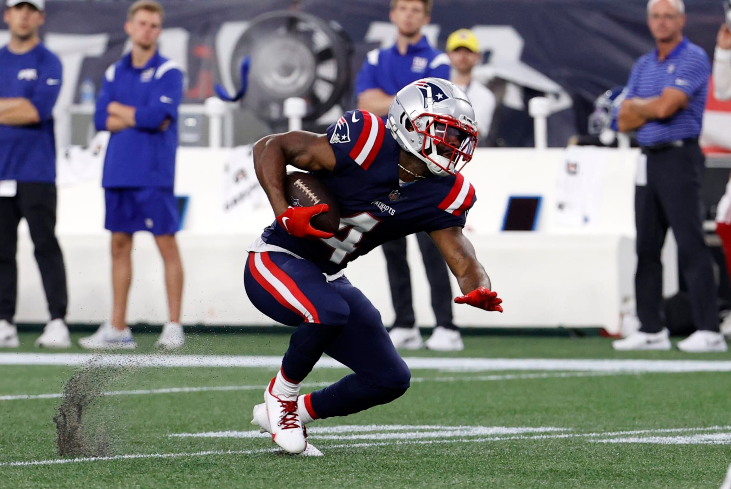 FOXBOROUGH, MA - AUGUST 11: New England Patriots cornerback Malcom Butler (4) recovers a fumble during an NFL preseason game between the New England Patriots and the New York Giants on August 11, 2022, at Gillette Stadium in Foxborough, Massachusetts. (Photo by Fred Kfoury III/Icon Sportswire via Getty Images)