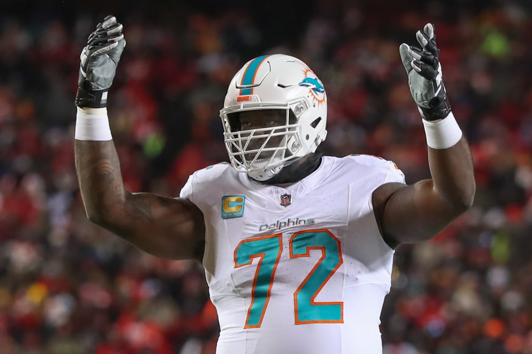 KANSAS CITY, MO - JANUARY 13: Miami Dolphins offensive tackle Terron Armstead (72) raises his hands in the second quarter of an AFC Wild Card playoff game between the Miami Dolphins and Kansas City Chiefs on Jan 13, 2024 at GEHA Field at Arrowhead Stadium in Kansas City, MO. (Photo by Scott Winters/Icon Sportswire via Getty Images)