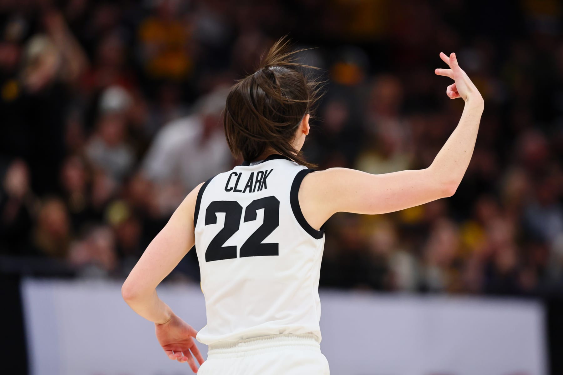 MINNEAPOLIS, MINNESOTA - MARCH 10: Caitlin Clark #22 of the Iowa Hawkeyes reacts after a three point basket in the first half against the Nebraska Cornhuskers during the Big Ten Women's Basketball Tournament Championship at Target Center on March 10, 2024 in Minneapolis, Minnesota. (Photo by Adam Bettcher/Getty Images)