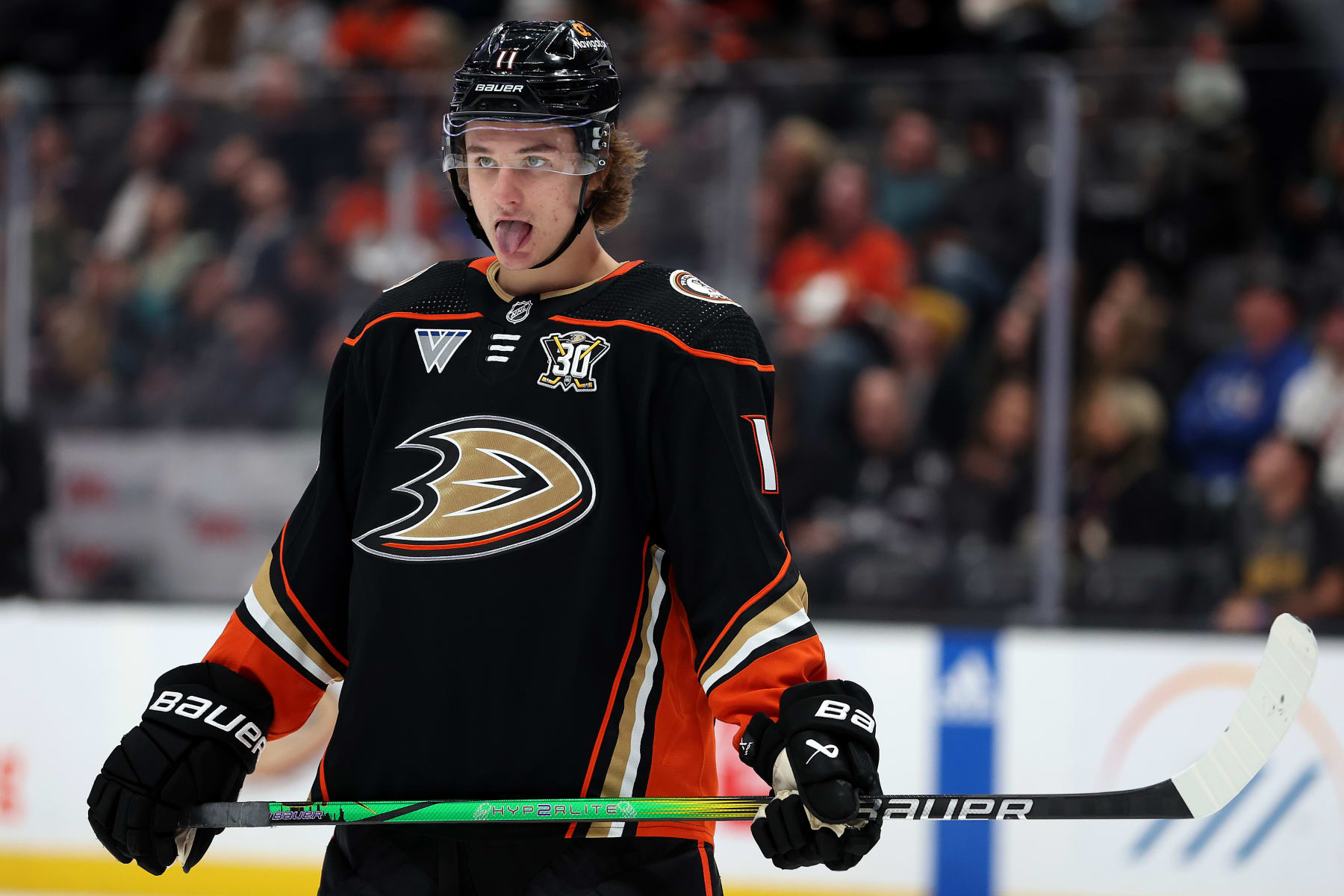 ANAHEIM, CALIFORNIA - JANUARY 05: Trevor Zegras #11 of the Anaheim Ducks looks on prior to a face off during the second period of a game against the Winnipeg Jets at Honda Center on January 05, 2024 in Anaheim, California. (Photo by Sean M. Haffey/Getty Images)