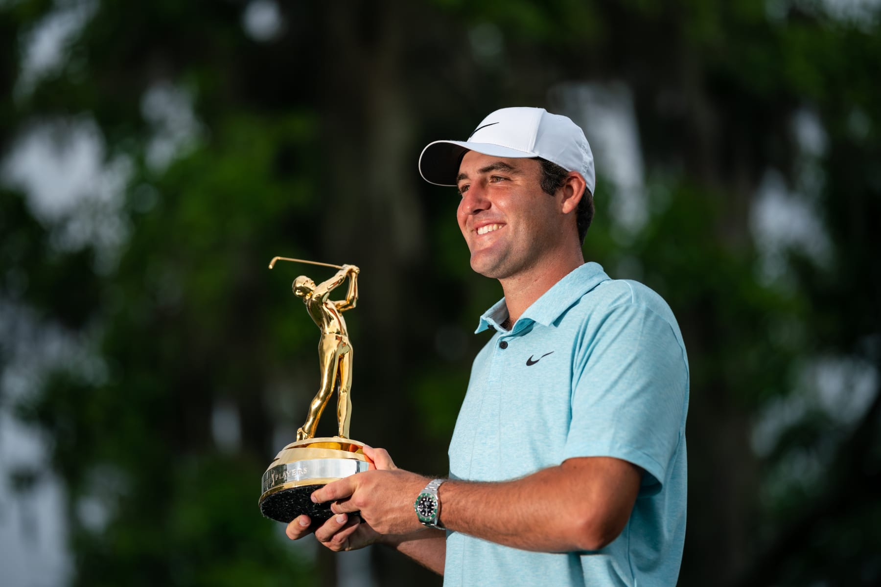PONTE VEDRA BEACH, FLORIDA - MARCH 12: Scottie Scheffler poses with THE PLAYERS Championship trophy after winning during the final round of THE PLAYERS Championship at Stadium Course at TPC Sawgrass on March 12, 2023 in Ponte Vedra Beach, Florida. (Photo by Rankin White/PGA TOUR via Getty Images)