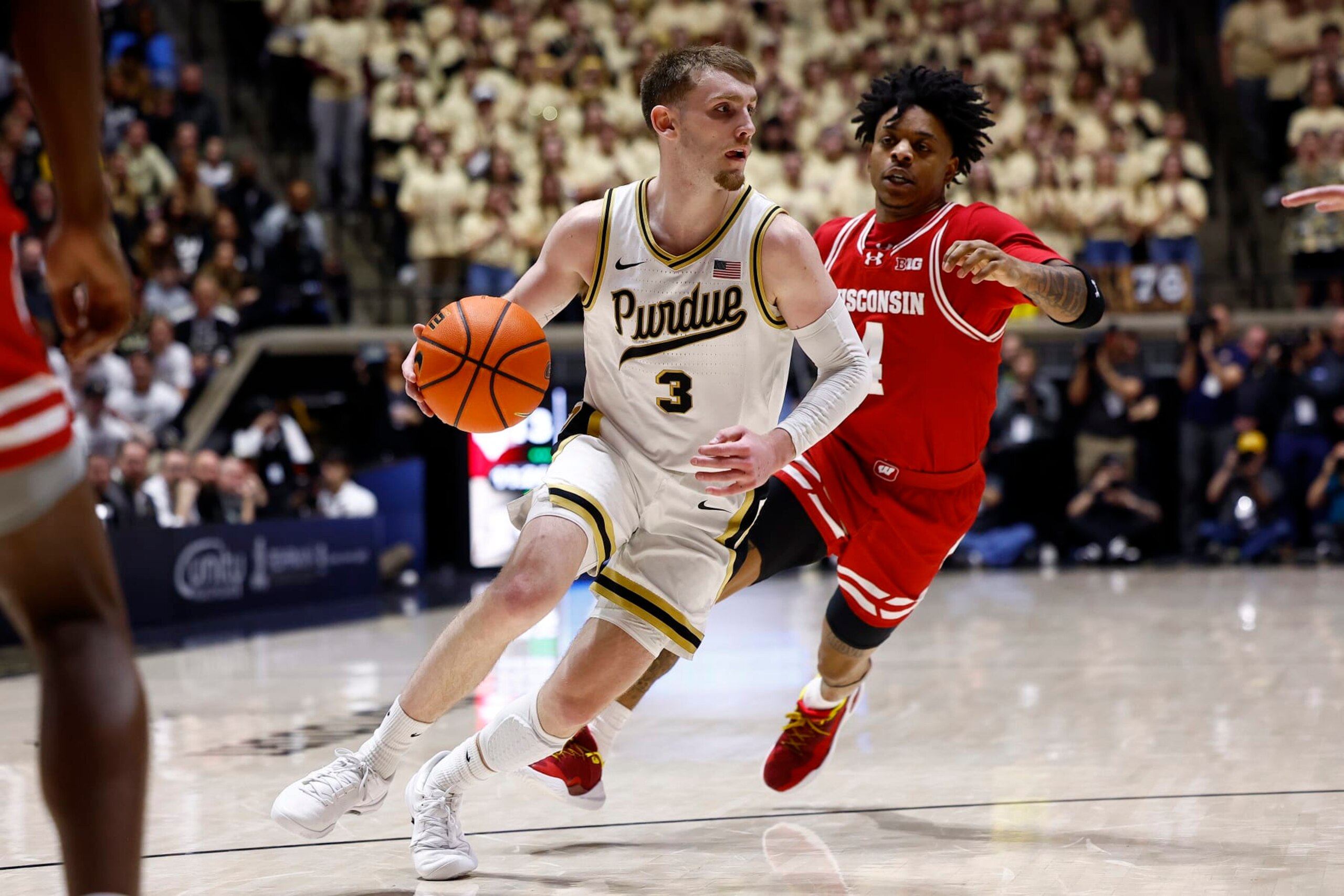 WEST LAFAYETTE, IN - MARCH 10: Purdue Boilermakers guard Braden Smith (3) drives past Wisconsin Badgers guard Kamari McGee (4) in the first half of play during a mens college basketball game between the Wisconsin Badgers and the Purdue Boilermakers on March 10, 2024 at Mackey Arena in West Lafayette, IN.(Photo by Jeffrey Brown/Icon Sportswire via Getty Images) WEST LAFAYETTE, IN - MARCH 10: Purdue Boilermakers guard Braden Smith (3) drives past Wisconsin Badgers guard Kamari McGee (4) in the first half of play during a mens college basketball game between the Wisconsin Badgers and the Purdue Boilermakers on March 10, 2024 at Mackey Arena in West Lafayette, IN.(Photo by Jeffrey Brown/Icon Sportswire via Getty Images)