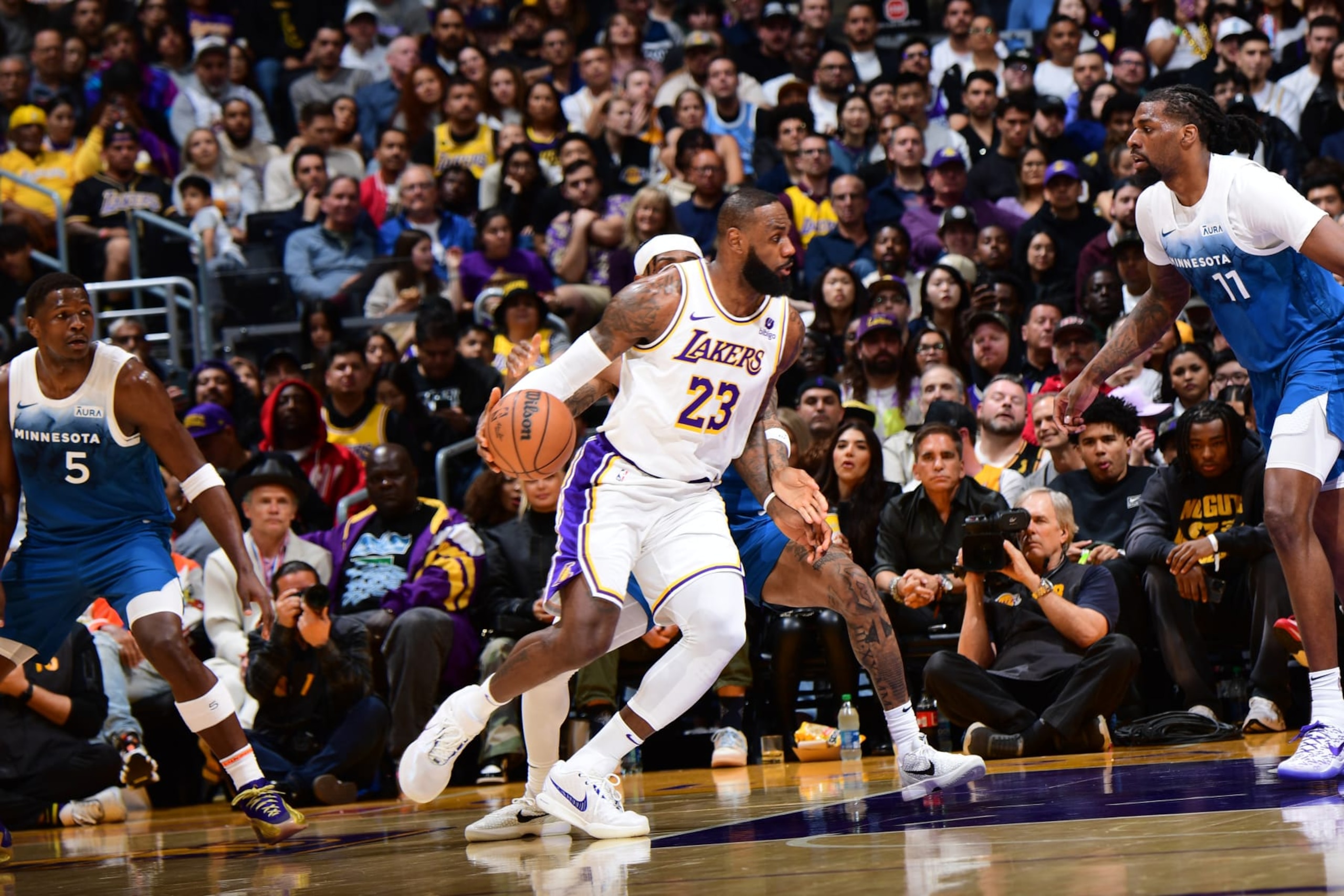 LOS ANGELES, CA - MARCH 10: LeBron James #23 of the Los Angeles Lakers dribbles the ball during the game against the Minnesota Timberwolves on March 10, 2024 at Crypto.Com Arena in Los Angeles, California. NOTE TO USER: User expressly acknowledges and agrees that, by downloading and/or using this Photograph, user is consenting to the terms and conditions of the Getty Images License Agreement. Mandatory Copyright Notice: Copyright 2024 NBAE (Photo by Adam Pantozzi/NBAE via Getty Images)