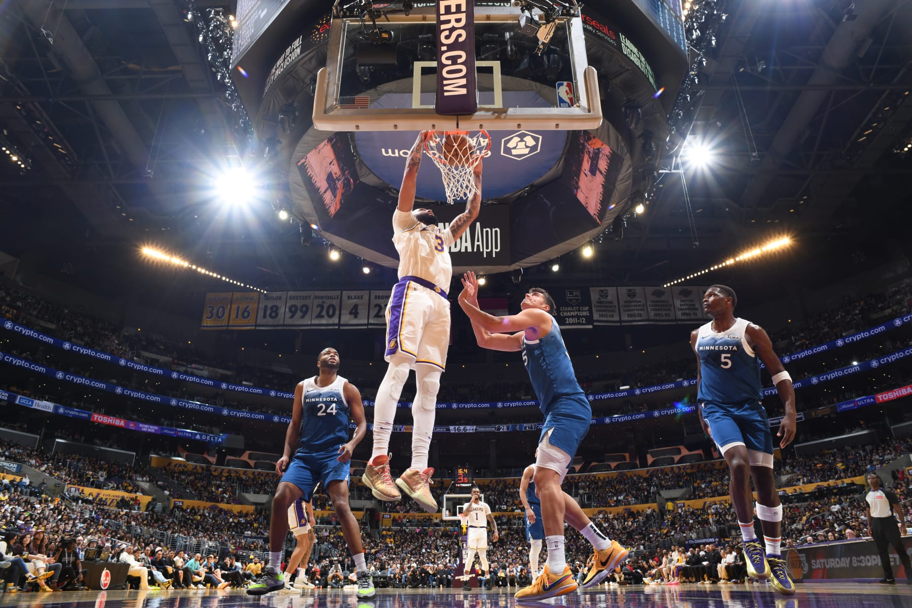 LOS ANGELES, CA - MARCH 10: Anthony Davis #3 of the Los Angeles Lakers dunks the ball during the game against the Minnesota Timberwolves on March 10, 2024 at Crypto.Com Arena in Los Angeles, California. NOTE TO USER: User expressly acknowledges and agrees that, by downloading and/or using this Photograph, user is consenting to the terms and conditions of the Getty Images License Agreement. Mandatory Copyright Notice: Copyright 2024 NBAE (Photo by Adam Pantozzi/NBAE via Getty Images)