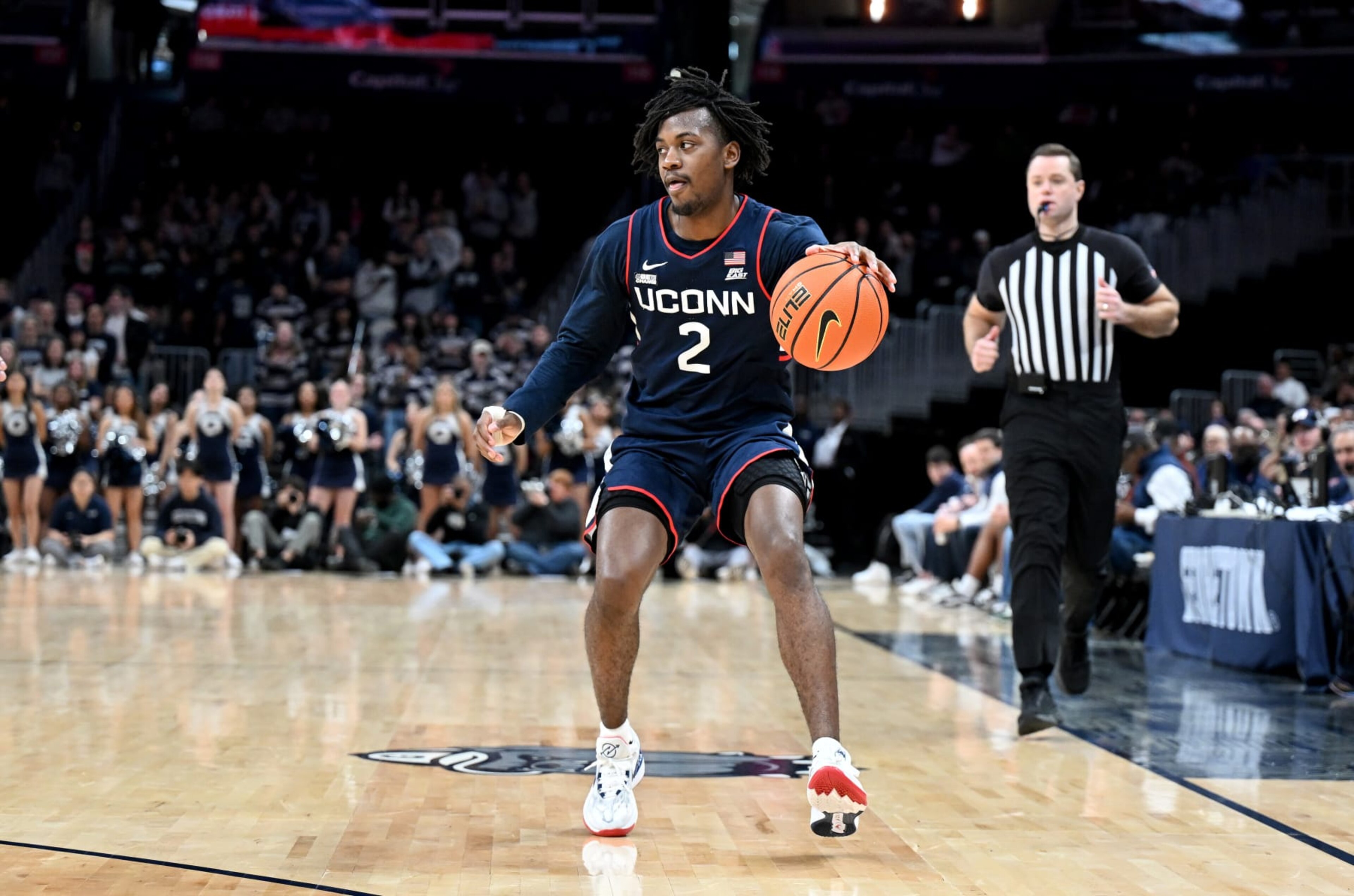 WASHINGTON, DC - FEBRUARY 10: Tristen Newton #2 of the Connecticut Huskies handles the ball against the Georgetown Hoyas at Capital One Arena on February 10, 2024 in Washington, DC. (Photo by G Fiume/Getty Images) WASHINGTON, DC - FEBRUARY 10: Tristen Newton #2 of the Connecticut Huskies handles the ball against the Georgetown Hoyas at Capital One Arena on February 10, 2024 in Washington, DC. (Photo by G Fiume/Getty Images)