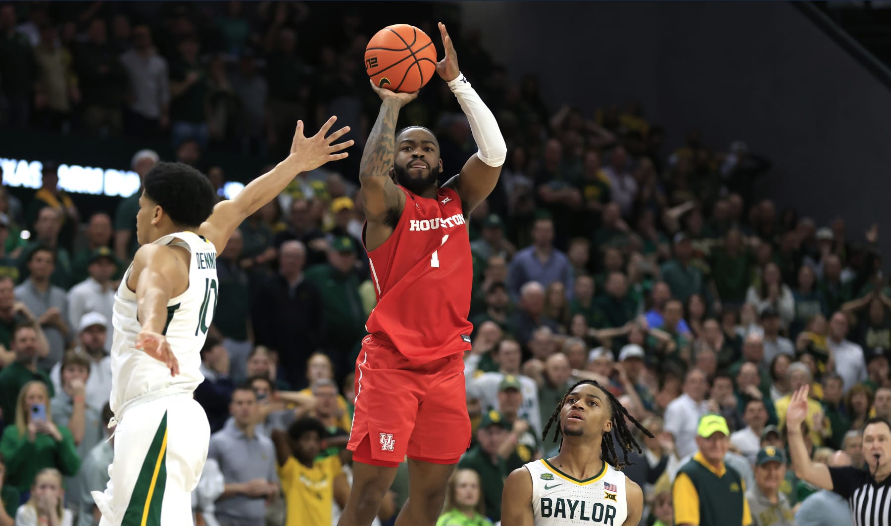 WACO, TX - FEBRUARY 24: Jamal Shead #1 of the Houston Cougars attempts a shot just after the buzzer in the second half against the Baylor Bears  at Foster Pavilion on February 24, 2024 in Waco, Texas. (Photo by Ron Jenkins/Getty Images)