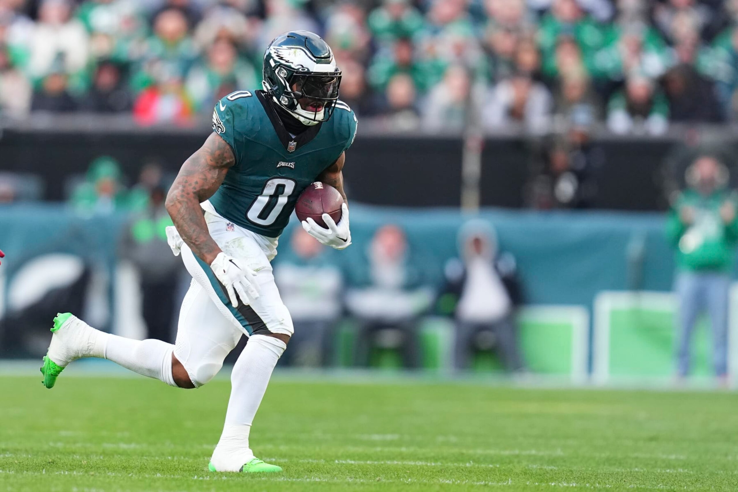 PHILADELPHIA, PENNSYLVANIA - DECEMBER 31: D'Andre Swift #0 of the Philadelphia Eagles runs the ball against the Arizona Cardinals at Lincoln Financial Field on December 31, 2023 in Philadelphia, Pennsylvania. (Photo by Mitchell Leff/Getty Images)