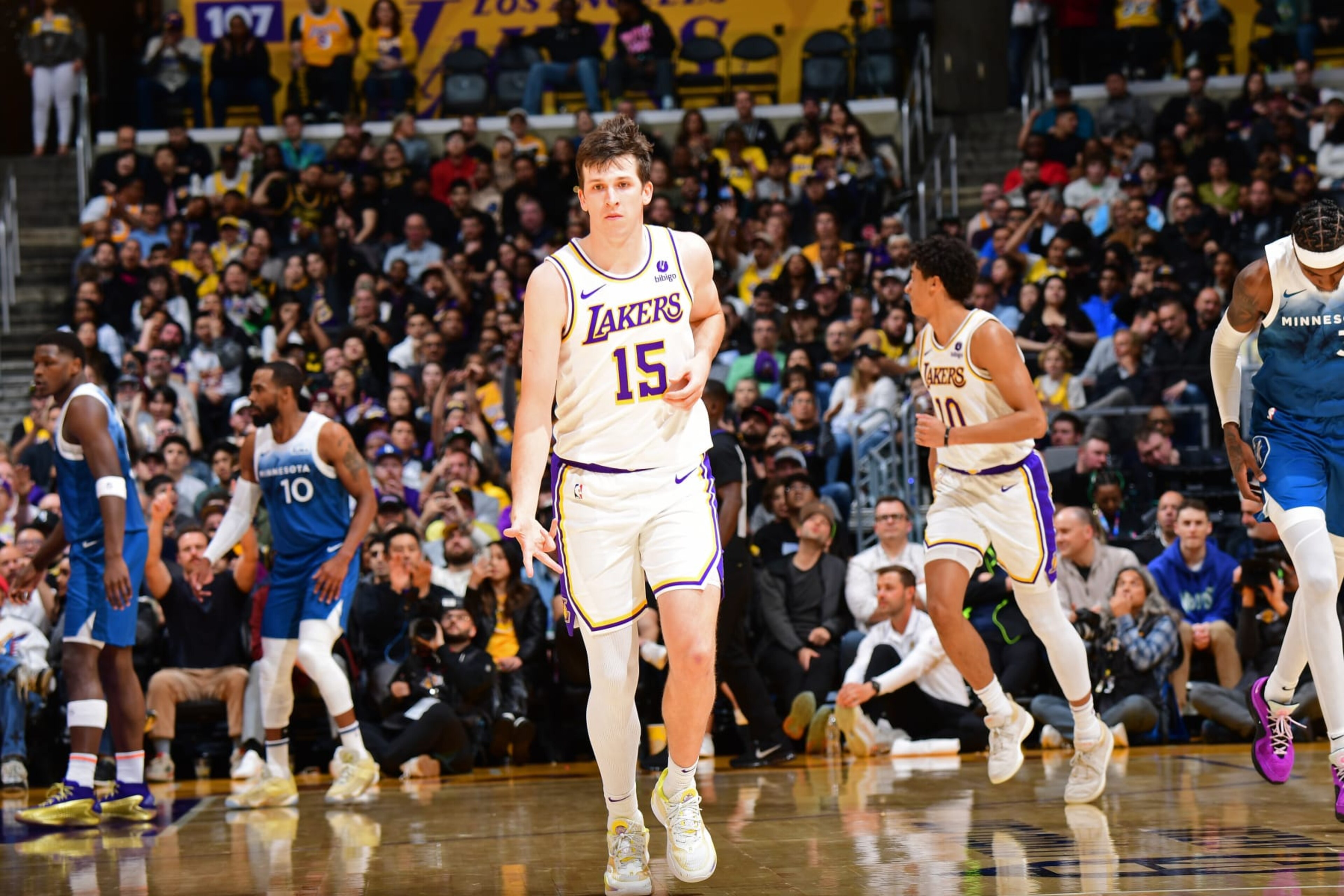 LOS ANGELES, CA - MARCH 10: Austin Reaves #15 of the Los Angeles Lakers celebrates during the game against the Minnesota Timberwolves on March 10, 2024 at Crypto.Com Arena in Los Angeles, California. NOTE TO USER: User expressly acknowledges and agrees that, by downloading and/or using this Photograph, user is consenting to the terms and conditions of the Getty Images License Agreement. Mandatory Copyright Notice: Copyright 2024 NBAE (Photo by Adam Pantozzi/NBAE via Getty Images)