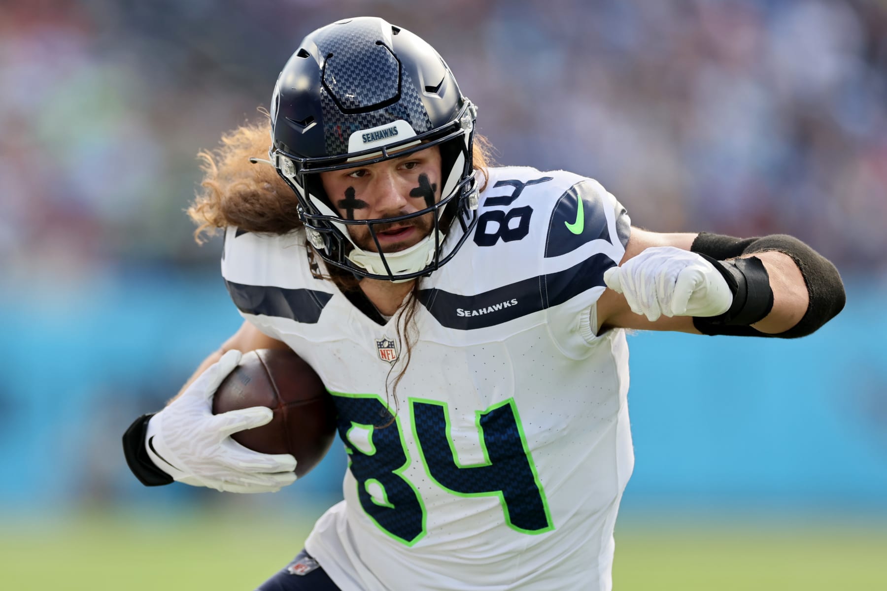 NASHVILLE, TENNESSEE - DECEMBER 24: Colby Parkinson #84 of the Seattle Seahawks runs the ball during the first half in the game against the Tennessee Titans at Nissan Stadium on December 24, 2023 in Nashville, Tennessee. (Photo by Andy Lyons/Getty Images) NASHVILLE, TENNESSEE - DECEMBER 24: Colby Parkinson #84 of the Seattle Seahawks runs the ball during the first half in the game against the Tennessee Titans at Nissan Stadium on December 24, 2023 in Nashville, Tennessee. (Photo by Andy Lyons/Getty Images)