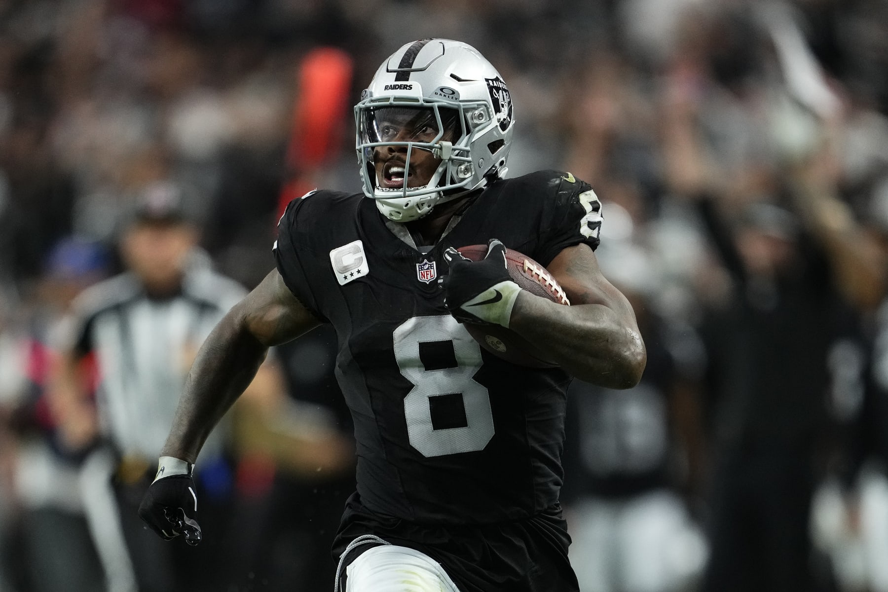 LAS VEGAS, NEVADA - NOVEMBER 26: Josh Jacobs #8 of the Las Vegas Raiders runs for a second quarter touchdown against the Kansas City Chiefs at Allegiant Stadium on November 26, 2023 in Las Vegas, Nevada. (Photo by Jeff Bottari/Getty Images) LAS VEGAS, NEVADA - NOVEMBER 26: Josh Jacobs #8 of the Las Vegas Raiders runs for a second quarter touchdown against the Kansas City Chiefs at Allegiant Stadium on November 26, 2023 in Las Vegas, Nevada. (Photo by Jeff Bottari/Getty Images)