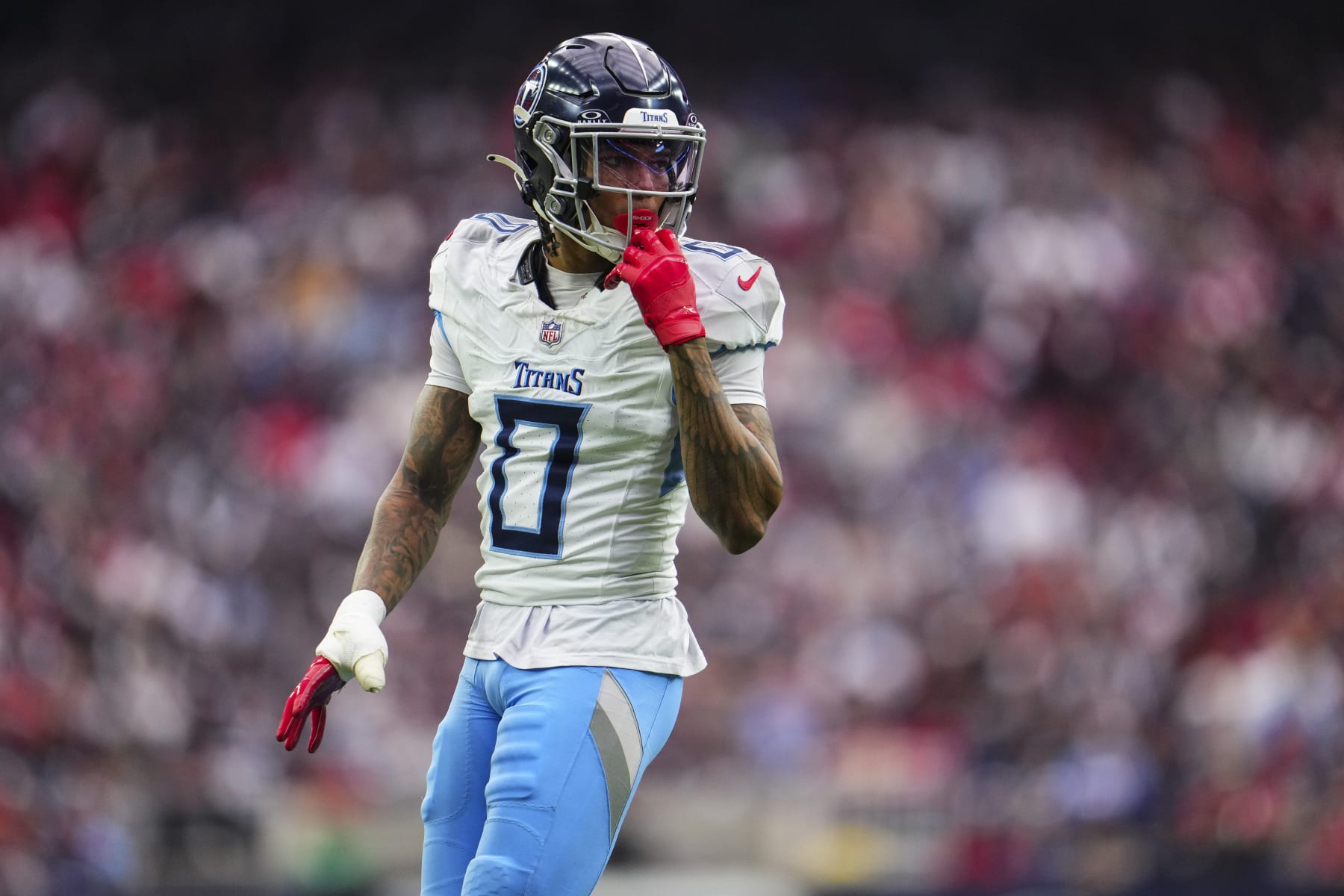 HOUSTON, TX - DECEMBER 31: Sean Murphy-Bunting #0 of the Tennessee Titans looks on from the field during an NFL football game against the Houston Texans at NRG Stadium on December 31, 2023 in Houston, Texas. (Photo by Cooper Neill/Getty Images) HOUSTON, TX - DECEMBER 31: Sean Murphy-Bunting #0 of the Tennessee Titans looks on from the field during an NFL football game against the Houston Texans at NRG Stadium on December 31, 2023 in Houston, Texas. (Photo by Cooper Neill/Getty Images)