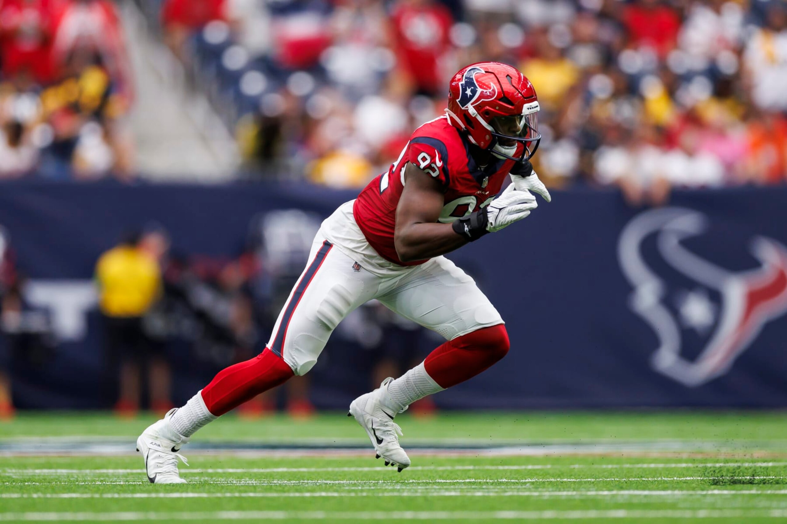 HOUSTON, TEXAS - OCTOBER 01: Dylan Horton #92 of the Houston Texans runs around the edge during an NFL football game against the Pittsburgh Steelers, Sunday at NRG Stadium on October 1, 2023 in Houston, Texas. (Photo by Ryan Kang/Getty Images)