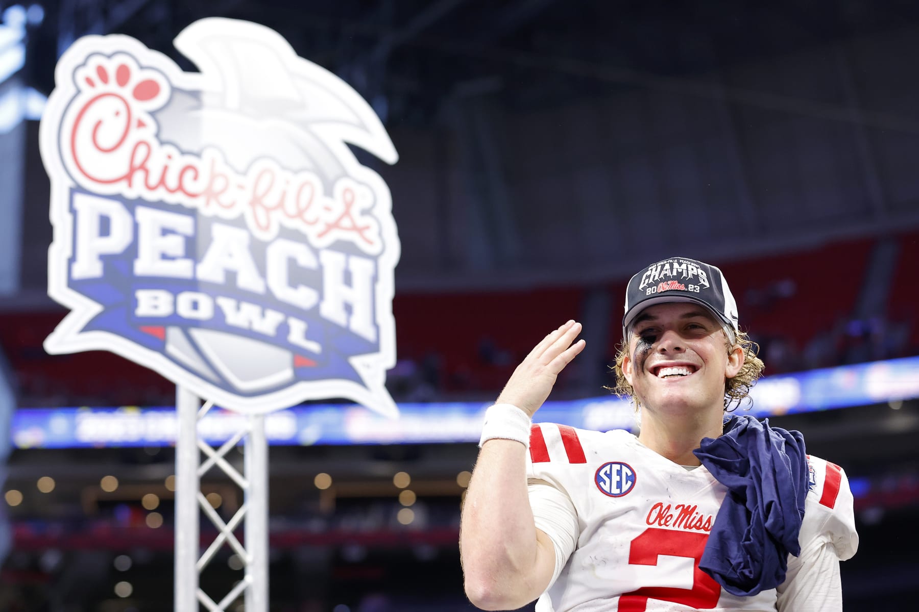 ATLANTA, GEORGIA - DECEMBER 30: Jaxson Dart #2 of the Mississippi Rebels celebrates after being Penn State Nittany Lions during the Chick-fil-A Peach Bowl at Mercedes-Benz Stadium on December 30, 2023 in Atlanta, Georgia. (Photo by Todd Kirkland/Getty Images)