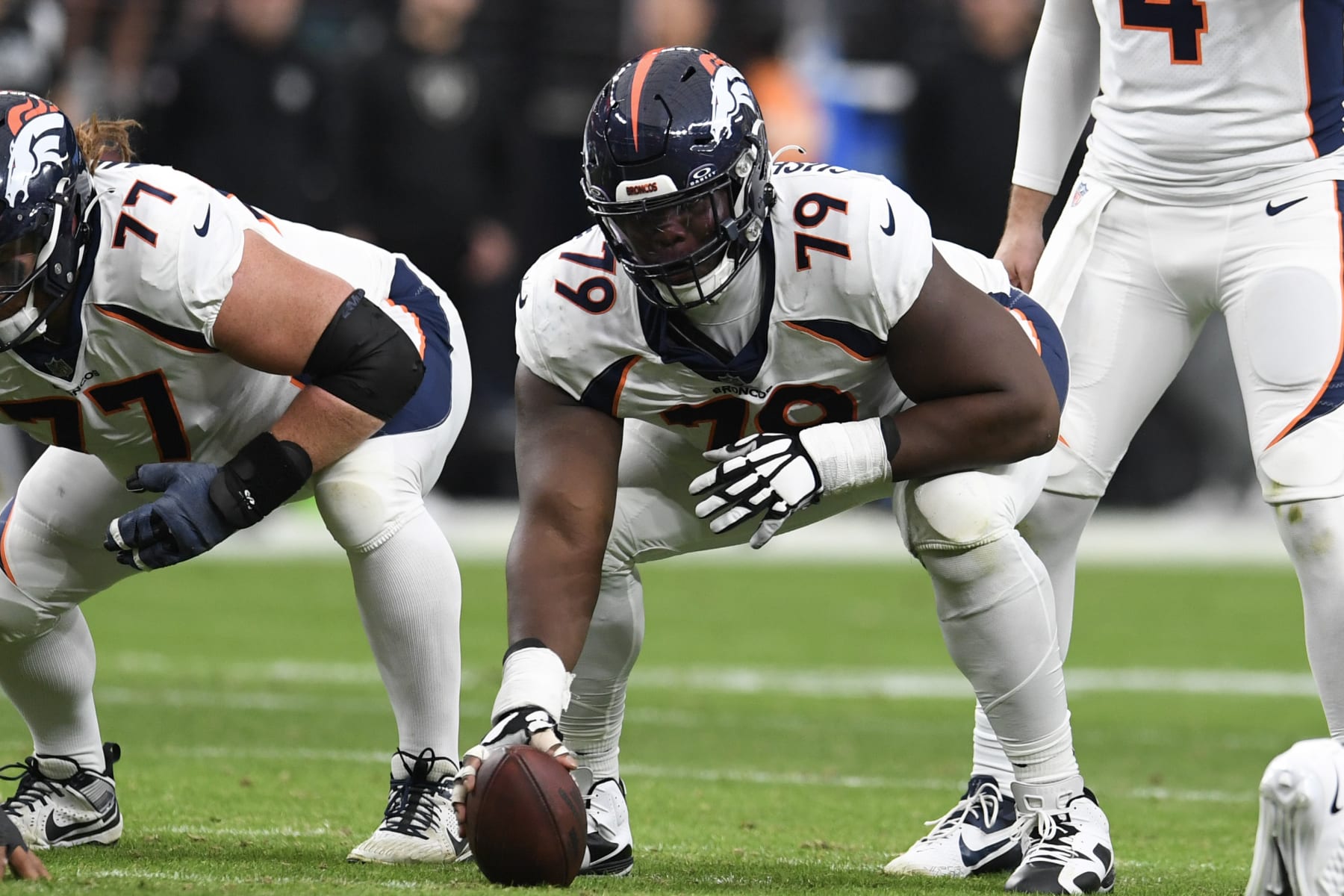 LAS VEGAS, NEVADA - JANUARY 07: Center Lloyd Cushenberry #79 of the Denver Broncos prepares to snap the ball against the Las Vegas Raiders in the second quarter at Allegiant Stadium on January 07, 2024 in Las Vegas, Nevada. The Raiders defeated the Broncos 27-14. (Photo by Candice Ward/Getty Images) LAS VEGAS, NEVADA - JANUARY 07: Center Lloyd Cushenberry #79 of the Denver Broncos prepares to snap the ball against the Las Vegas Raiders in the second quarter at Allegiant Stadium on January 07, 2024 in Las Vegas, Nevada. The Raiders defeated the Broncos 27-14. (Photo by Candice Ward/Getty Images)