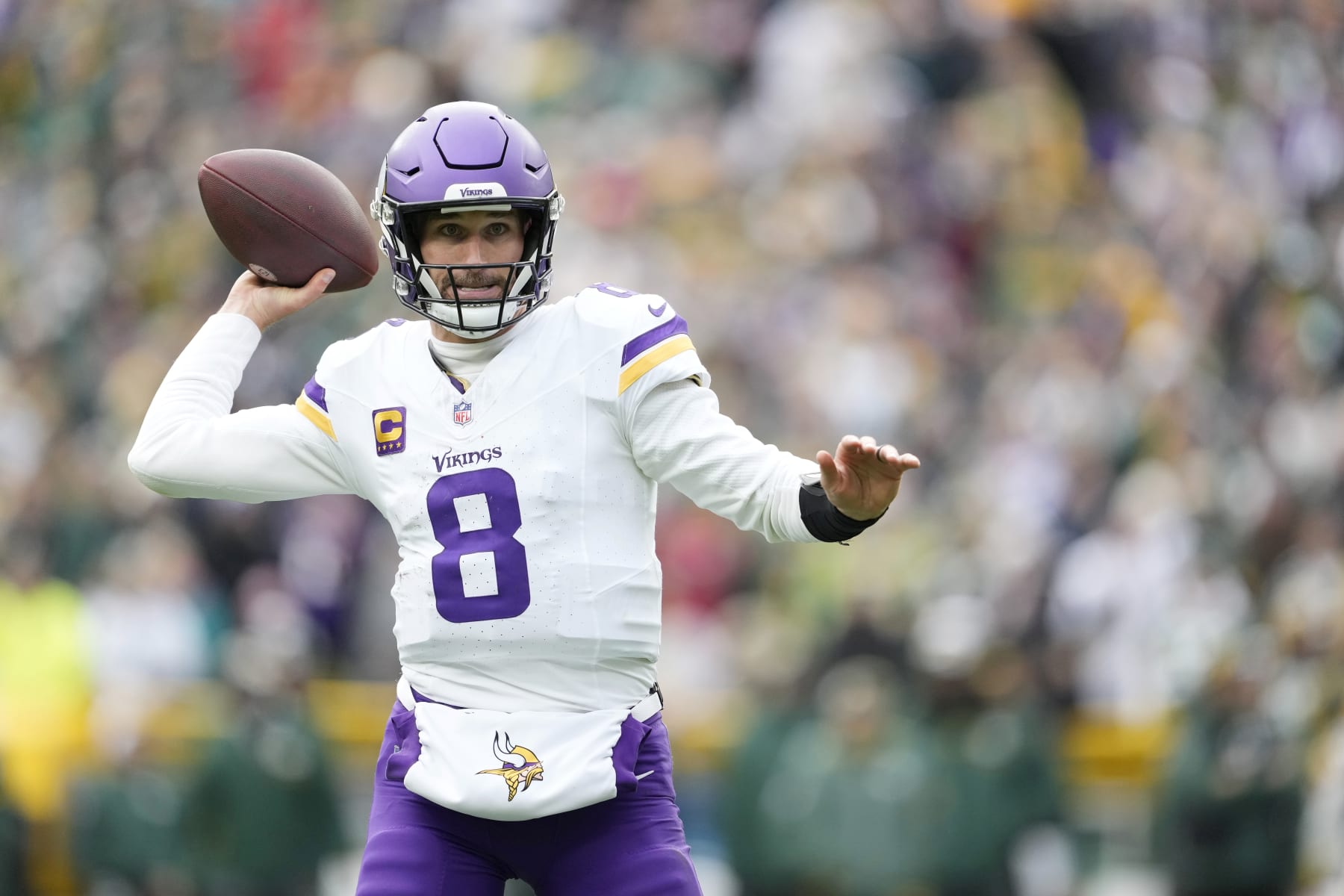 GREEN BAY, WISCONSIN - OCTOBER 29: Kirk Cousins #8 of the Minnesota Vikings looks to throw a pass in the third quarter against the Green Bay Packers at Lambeau Field on October 29, 2023 in Green Bay, Wisconsin. (Photo by Patrick McDermott/Getty Images)