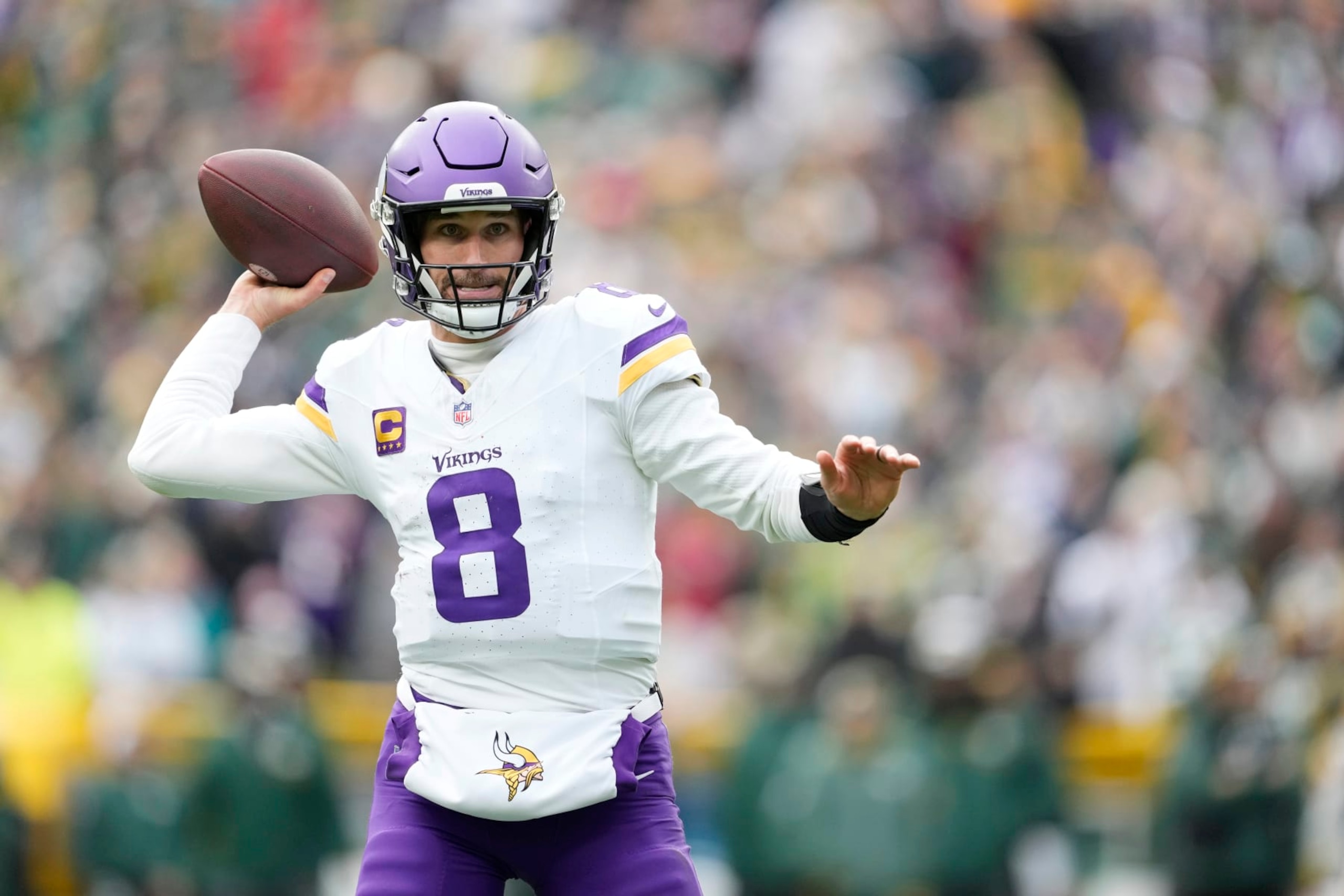 GREEN BAY, WISCONSIN - OCTOBER 29: Kirk Cousins #8 of the Minnesota Vikings looks to throw a pass in the third quarter against the Green Bay Packers at Lambeau Field on October 29, 2023 in Green Bay, Wisconsin. (Photo by Patrick McDermott/Getty Images)