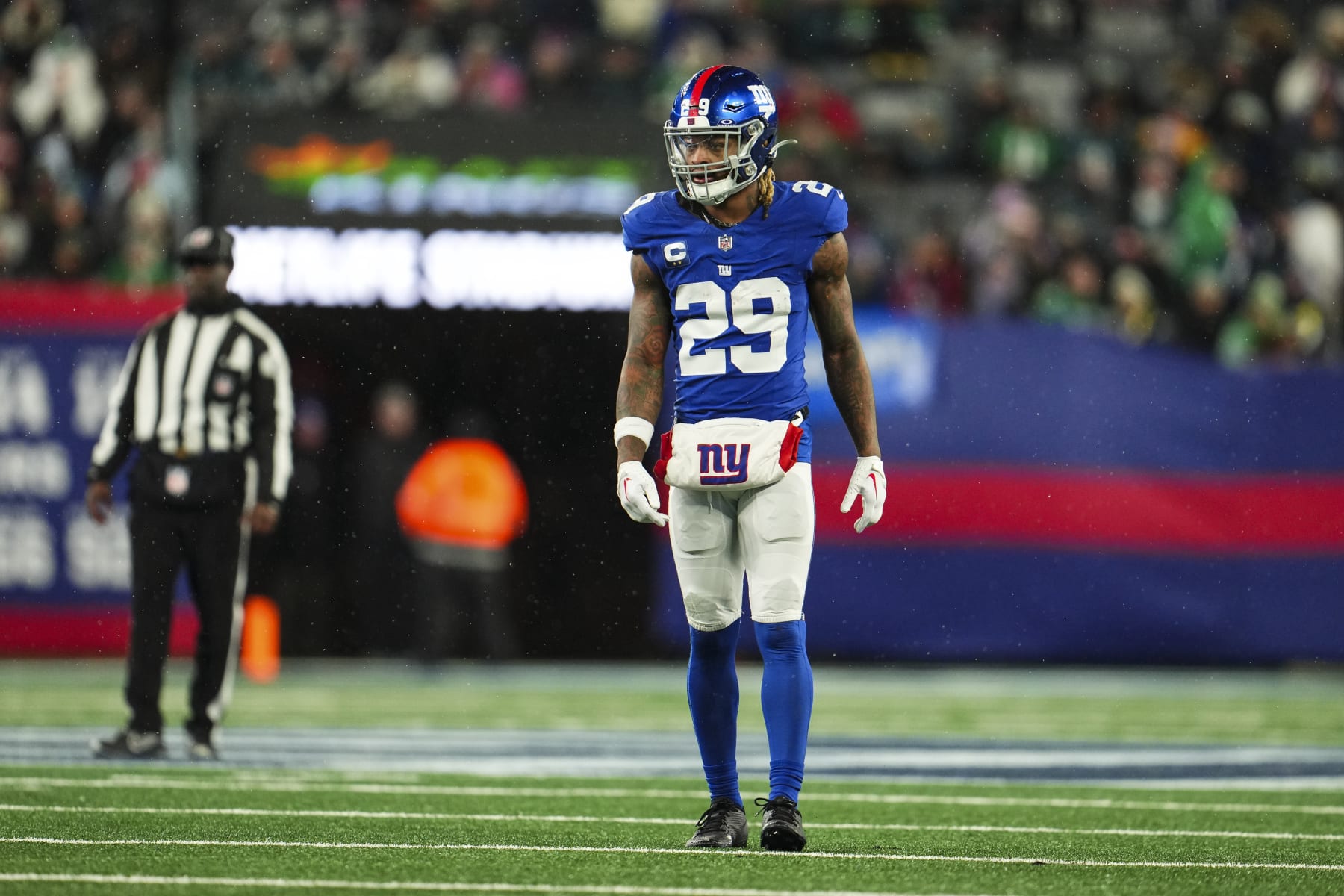 EAST RUTHERFORD, NJ - JANUARY 07: Xavier McKinney #29 of the New York Giants looks on from the field during an NFL football game against the Philadelphia Eagles at MetLife Stadium on January 7, 2024 in East Rutherford, New Jersey. (Photo by Cooper Neill/Getty Images)