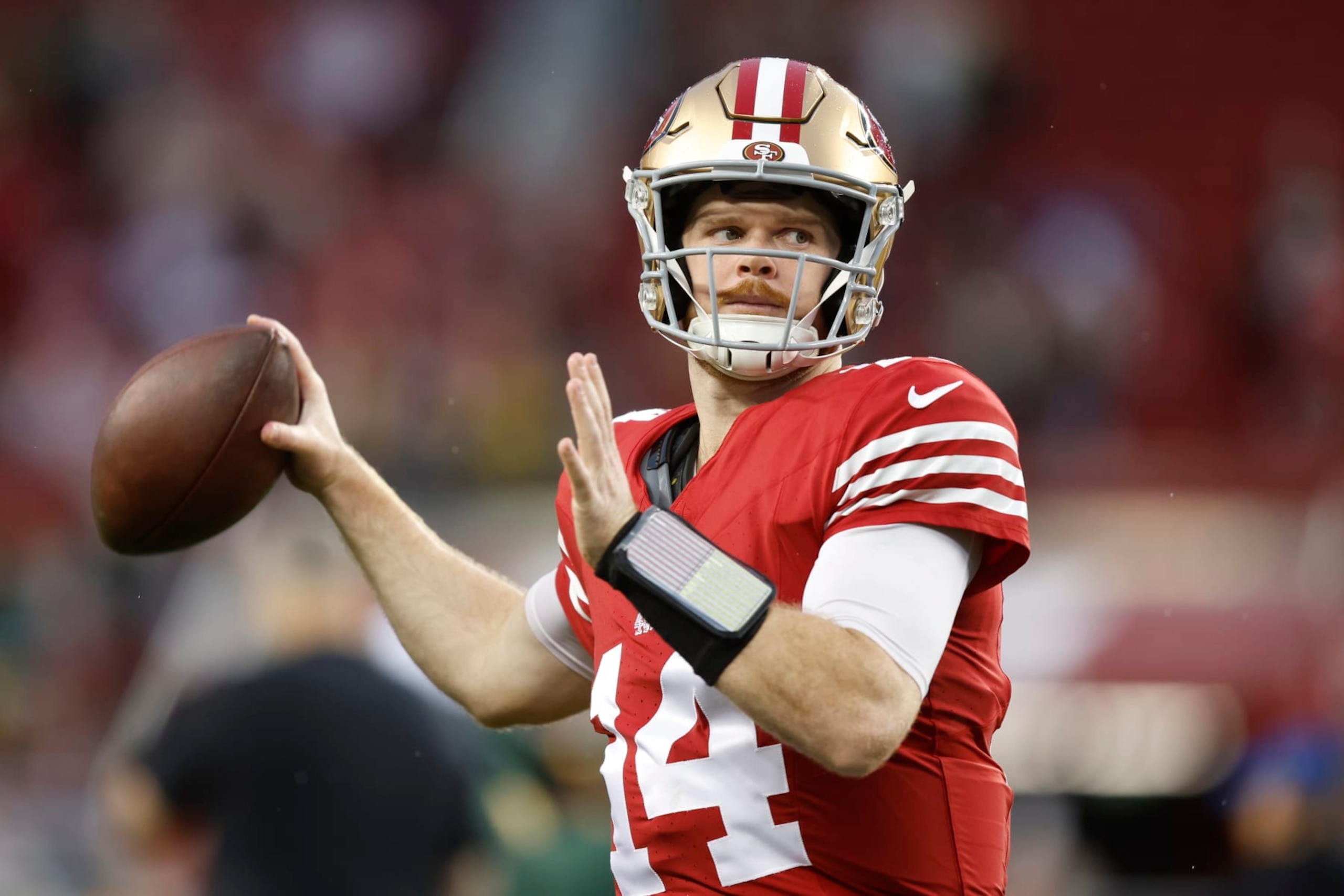 SANTA CLARA, CALIFORNIA - JANUARY 20: Sam Darnold #14 of the San Francisco 49ers warms up before the NFC Divisional Playoffs against the Green Bay Packers at Levi's Stadium on January 20, 2024 in Santa Clara, California. (Photo by Lachlan Cunningham/Getty Images) SANTA CLARA, CALIFORNIA - JANUARY 20: Sam Darnold #14 of the San Francisco 49ers warms up before the NFC Divisional Playoffs against the Green Bay Packers at Levi's Stadium on January 20, 2024 in Santa Clara, California. (Photo by Lachlan Cunningham/Getty Images)