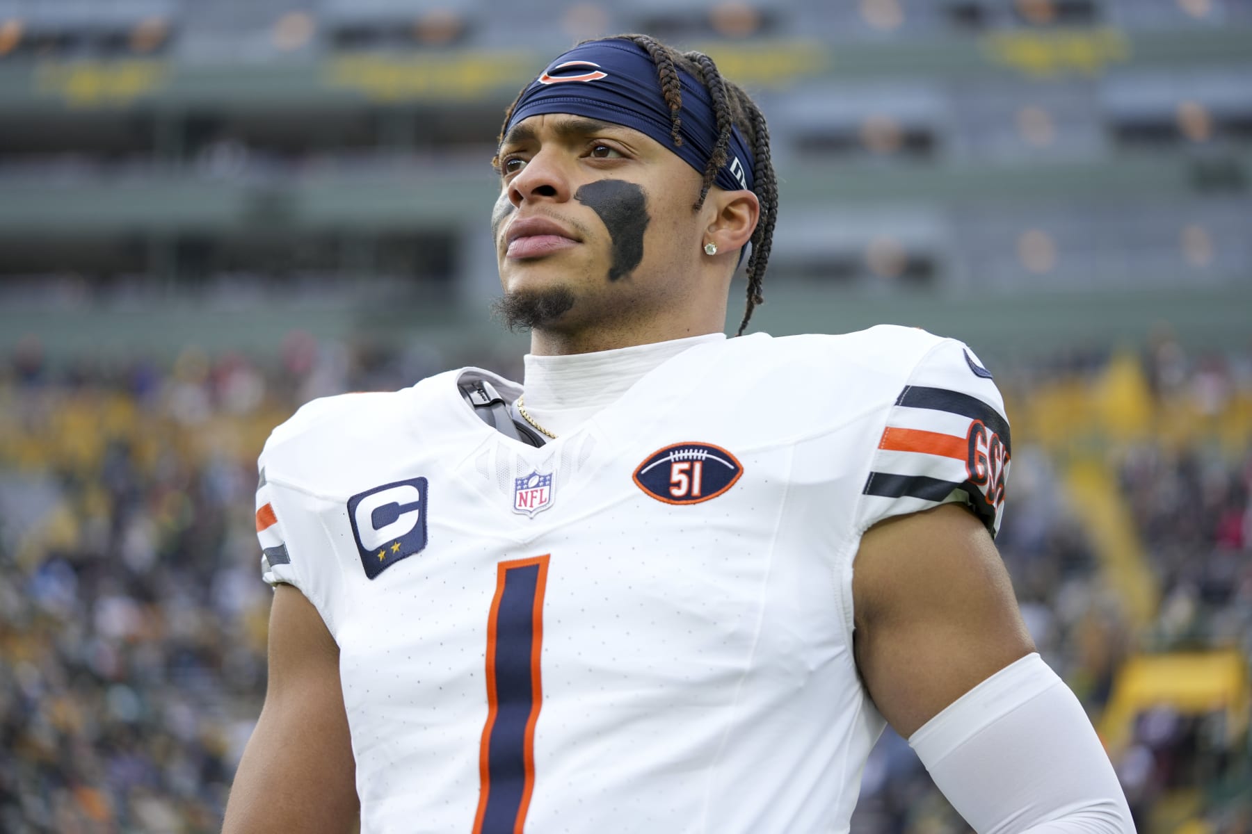 GREEN BAY, WI - JANUARY 7: Quarterback Justin Fields #1 of the Chicago Bears stretches prior to an NFL football game against the Green Bay Packers at Lambeau Field on January 7, 2024 in Green Bay, Wisconsin. The Packers beat the Bears 17-9. (Photo by Todd Rosenberg/Getty Images)