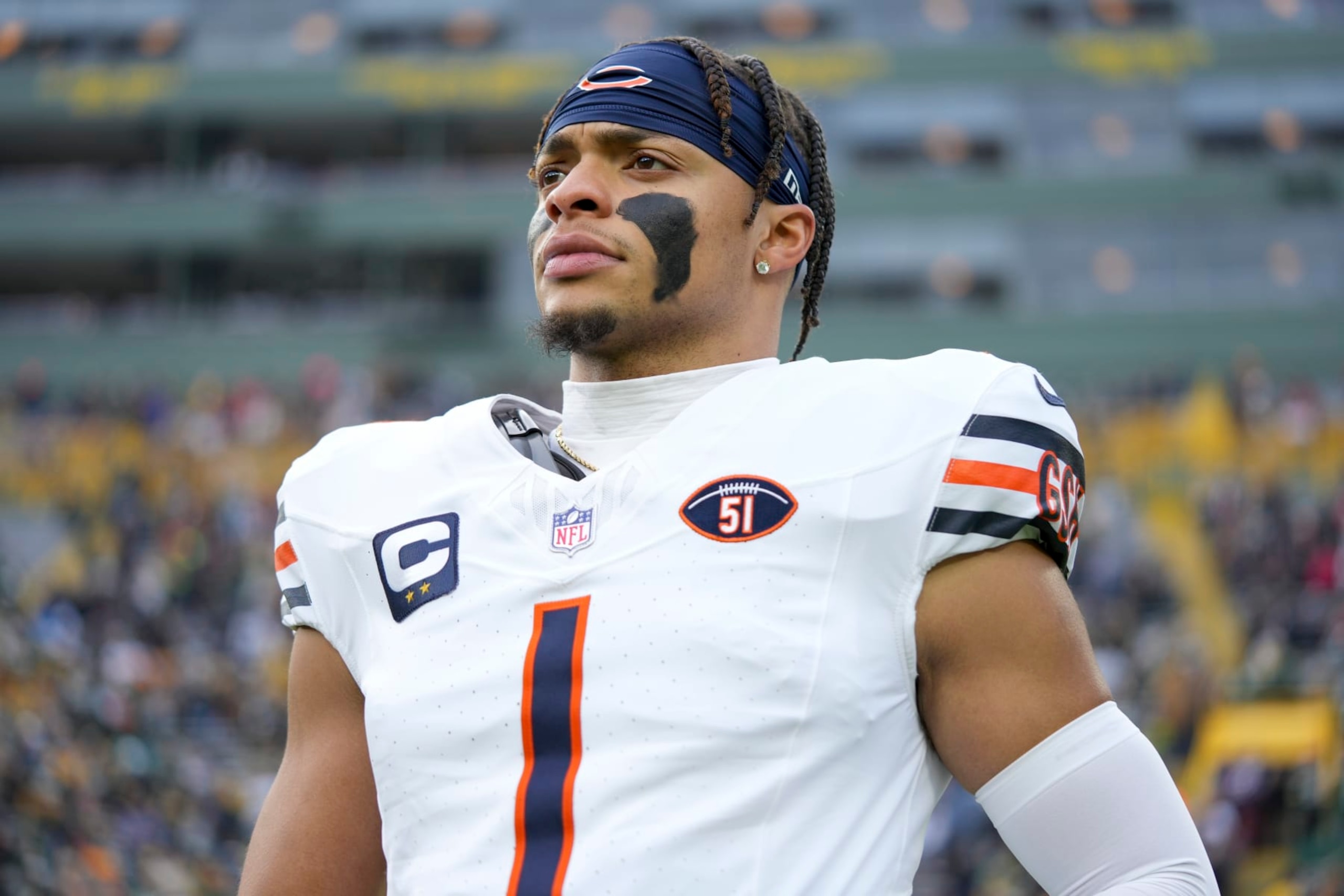 GREEN BAY, WI - JANUARY 7: Quarterback Justin Fields #1 of the Chicago Bears stretches prior to an NFL football game against the Green Bay Packers at Lambeau Field on January 7, 2024 in Green Bay, Wisconsin. The Packers beat the Bears 17-9. (Photo by Todd Rosenberg/Getty Images) GREEN BAY, WI - JANUARY 7: Quarterback Justin Fields #1 of the Chicago Bears stretches prior to an NFL football game against the Green Bay Packers at Lambeau Field on January 7, 2024 in Green Bay, Wisconsin. The Packers beat the Bears 17-9. (Photo by Todd Rosenberg/Getty Images)