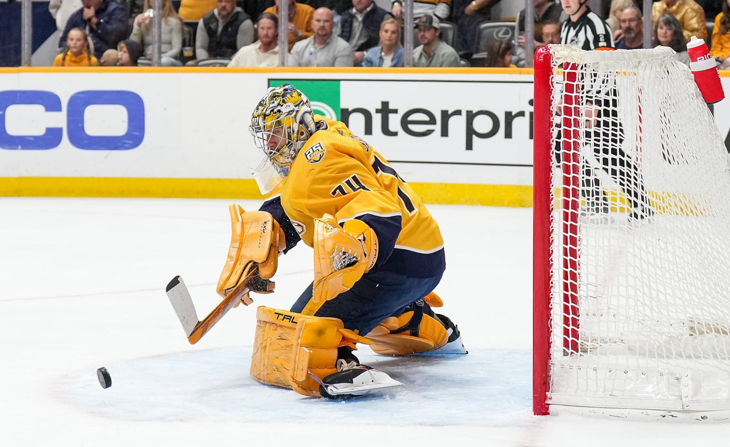 NASHVILLE, TENNESSEE - MARCH 2: Juuse Saros #74 of the Nashville Predators makes a save against the Colorado Avalanche during an NHL game at Bridgestone Arena on March 2, 2024 in Nashville, Tennessee. (Photo by John Russell/NHLI via Getty Images)