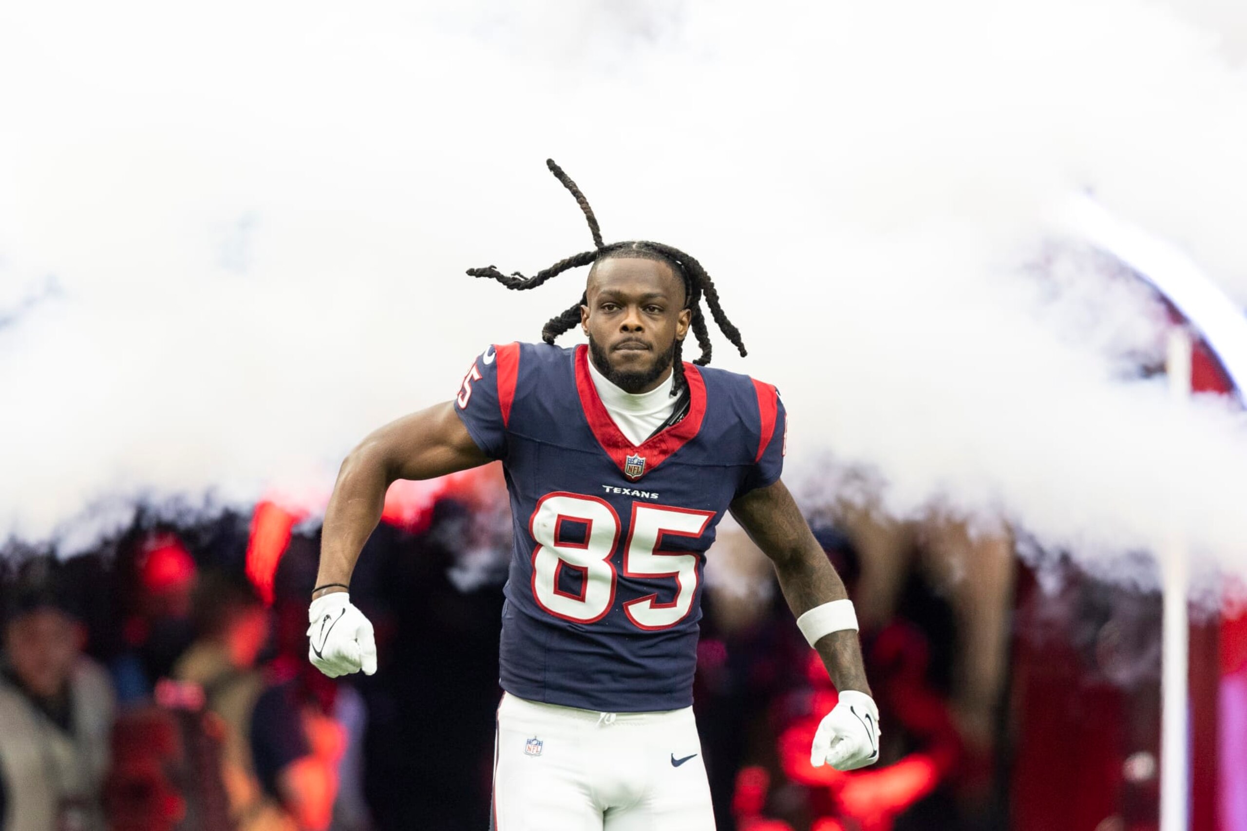 HOUSTON, TEXAS - JANUARY 13: Noah Brown #85 of the Houston Texans reacts as he takes the field prior to an NFL wild-card playoff football game between the Houston Texans and the Cleveland Browns at NRG Stadium on January 13, 2024 in Houston, Texas. (Photo by Michael Owens/Getty Images)