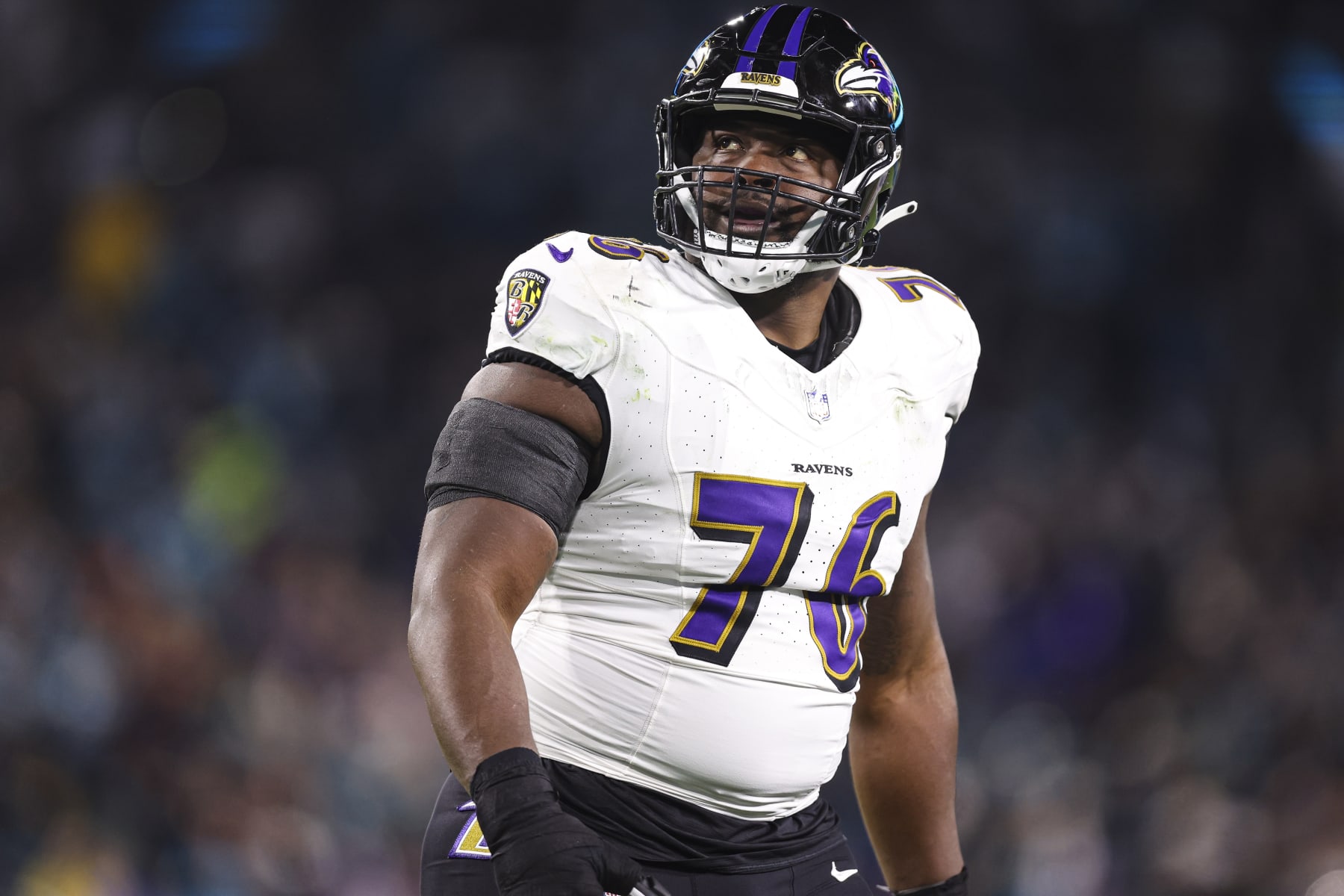 JACKSONVILLE, FL - DECEMBER 17: John Simpson #76 of the Baltimore Ravens looks on from the field during an NFL football game against the Jacksonville Jaguars at EverBank Stadium on December 17, 2023 in Jacksonville, Florida. (Photo by Perry Knotts/Getty Images) JACKSONVILLE, FL - DECEMBER 17: John Simpson #76 of the Baltimore Ravens looks on from the field during an NFL football game against the Jacksonville Jaguars at EverBank Stadium on December 17, 2023 in Jacksonville, Florida. (Photo by Perry Knotts/Getty Images)