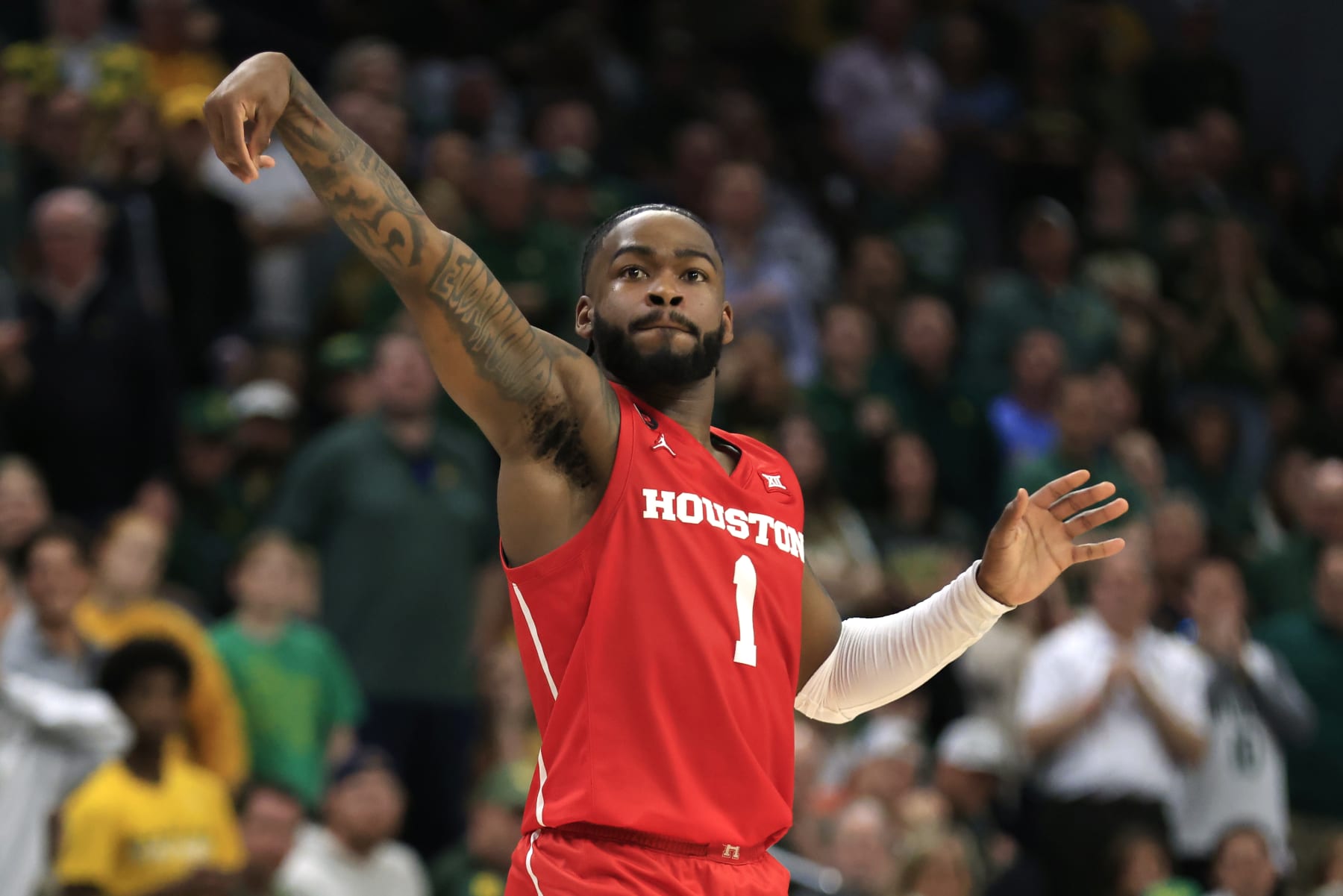 WACO, TX - FEBRUARY 24: Jamal Shead #1 of the Houston Cougars attempts a three point basket against the Baylor Bears in the second half at Foster Pavilion on February 24, 2024 in Waco, Texas. (Photo by Ron Jenkins/Getty Images)