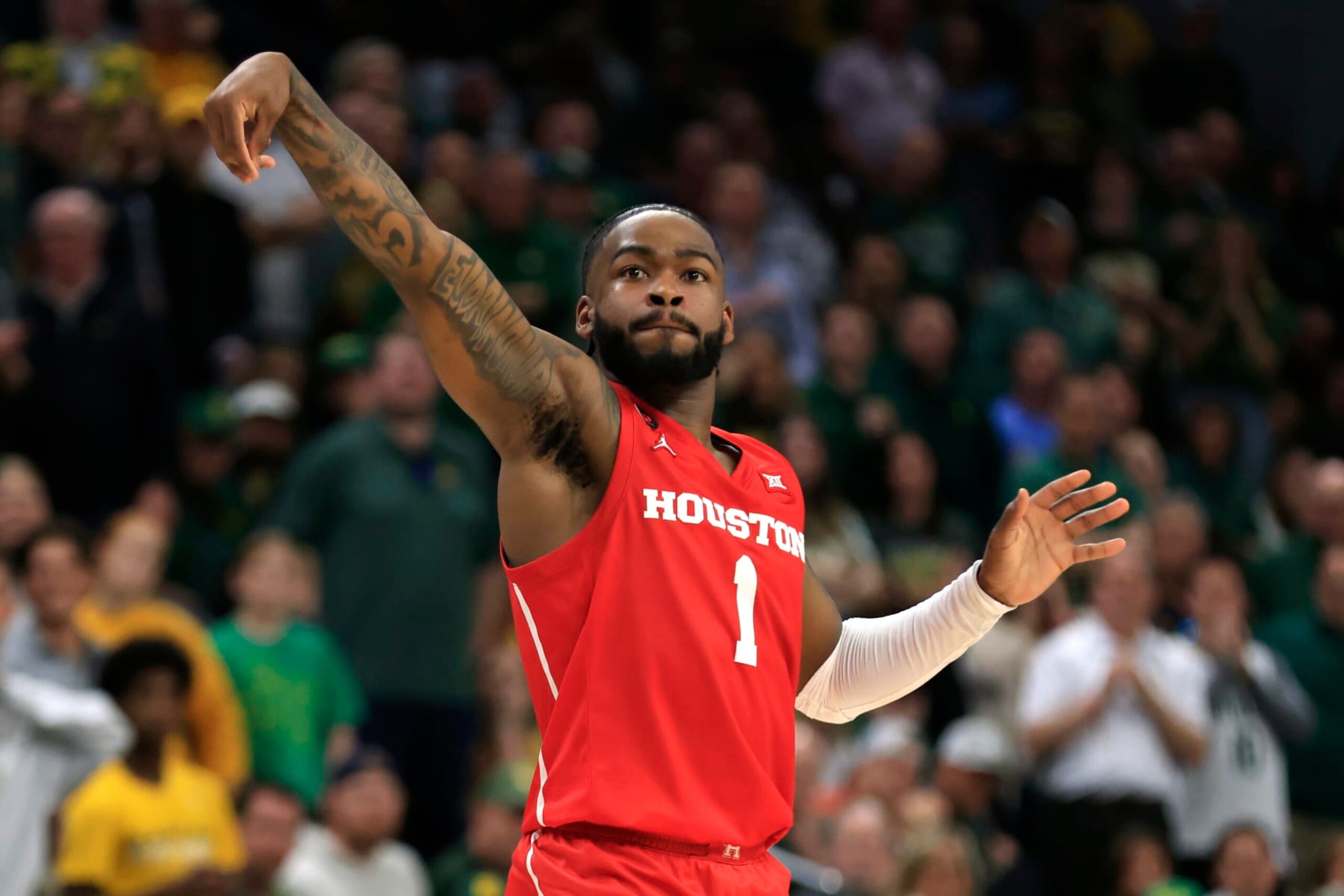 WACO, TX - FEBRUARY 24: Jamal Shead #1 of the Houston Cougars attempts a three point basket against the Baylor Bears in the second half at Foster Pavilion on February 24, 2024 in Waco, Texas. (Photo by Ron Jenkins/Getty Images) WACO, TX - FEBRUARY 24: Jamal Shead #1 of the Houston Cougars attempts a three point basket against the Baylor Bears in the second half at Foster Pavilion on February 24, 2024 in Waco, Texas. (Photo by Ron Jenkins/Getty Images)